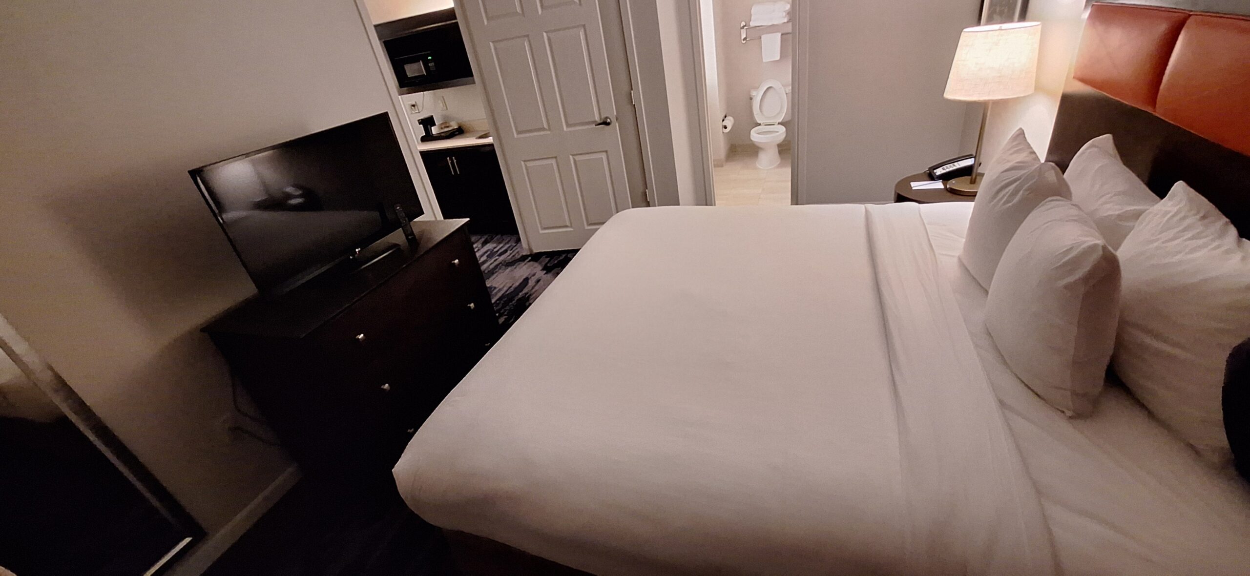 a bed in a hotel room