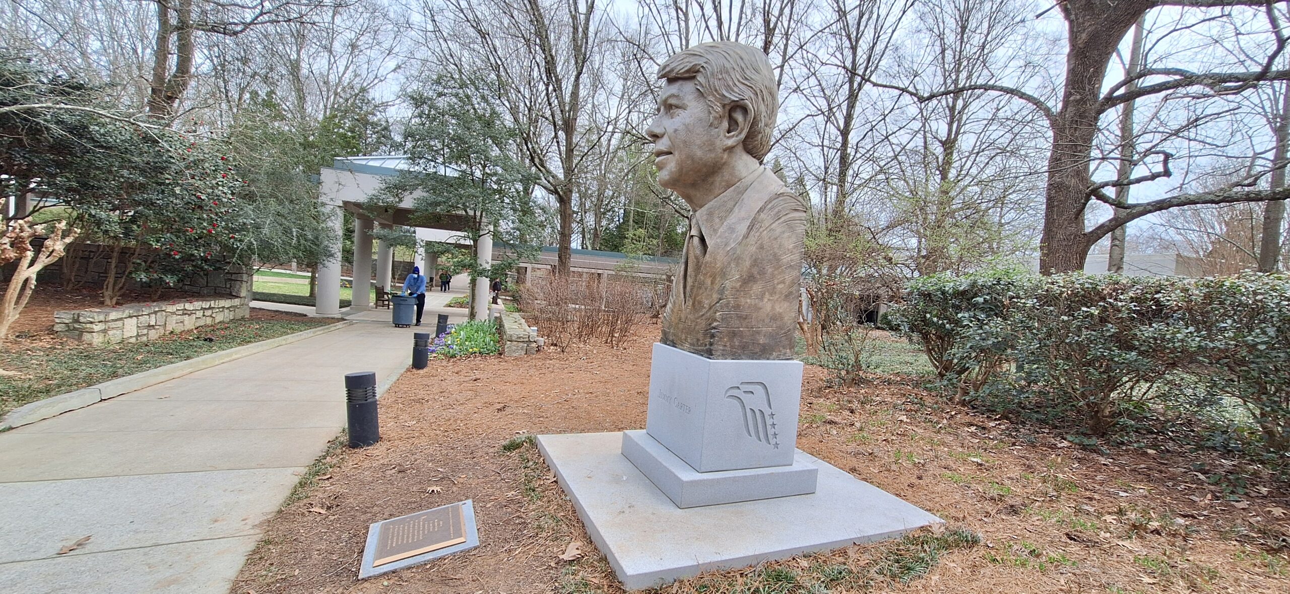 a statue of a man in a park