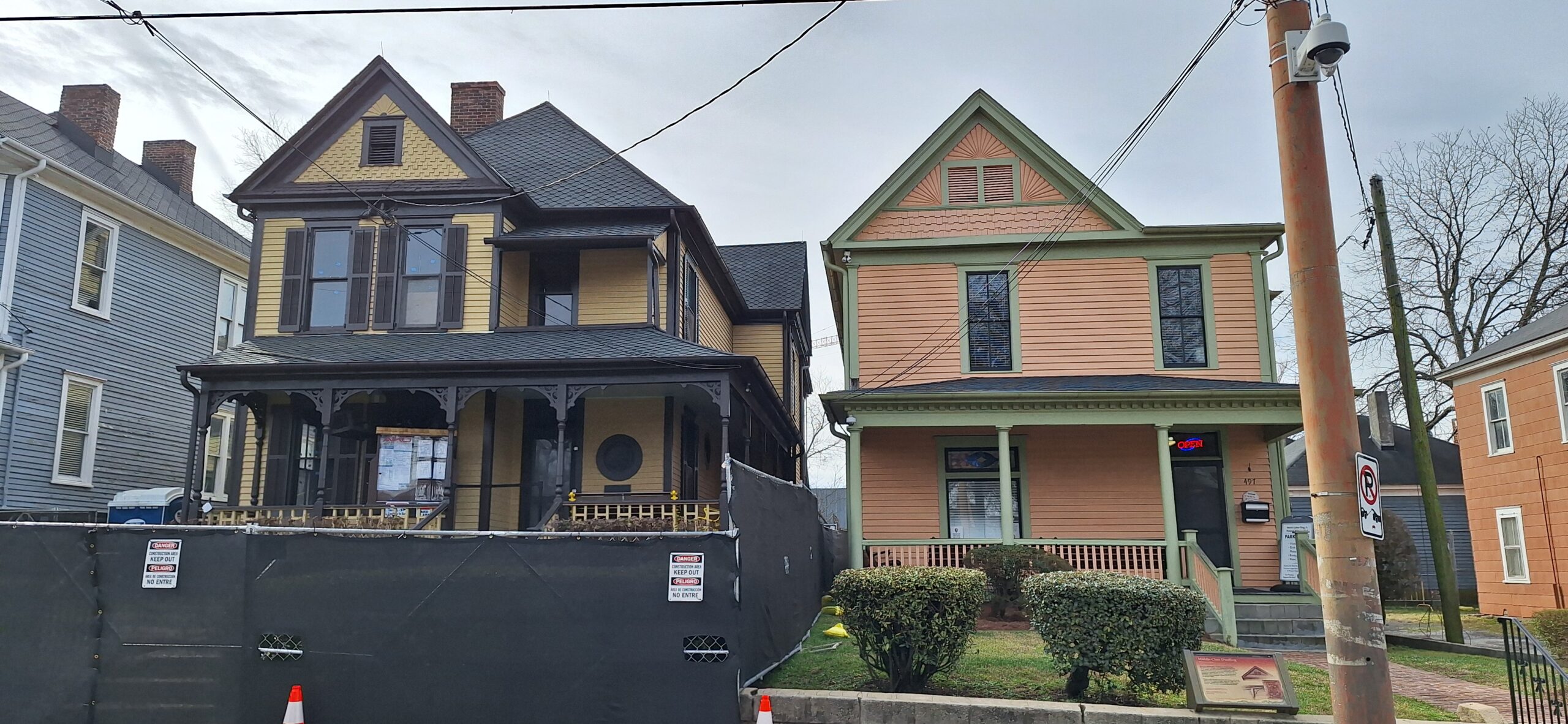 a row of houses with a fence