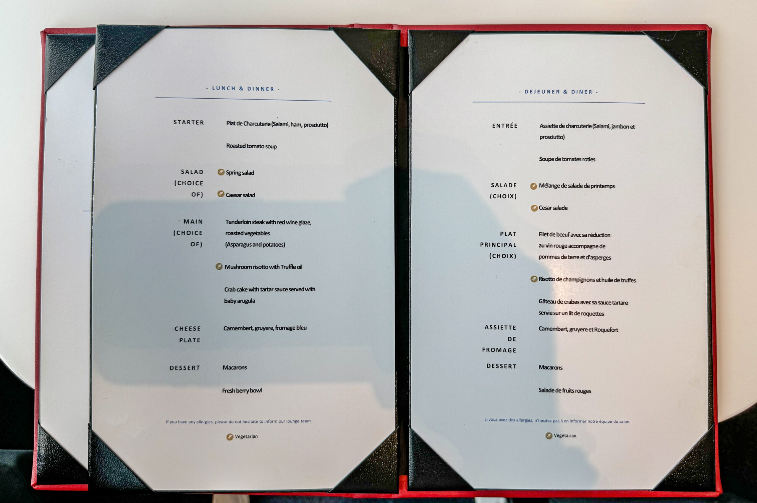 a menu on a red surface