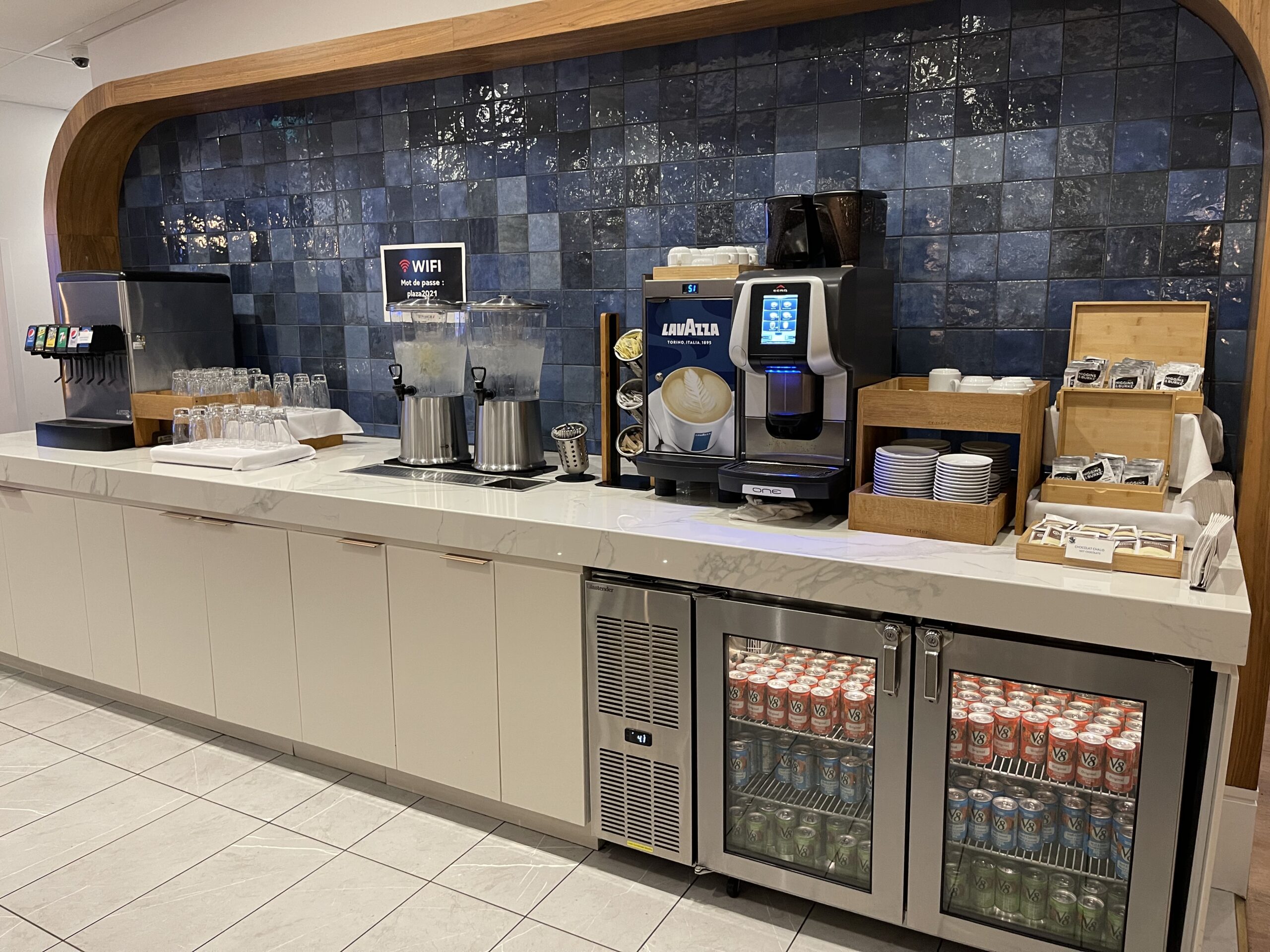 a counter with drinks and beverages