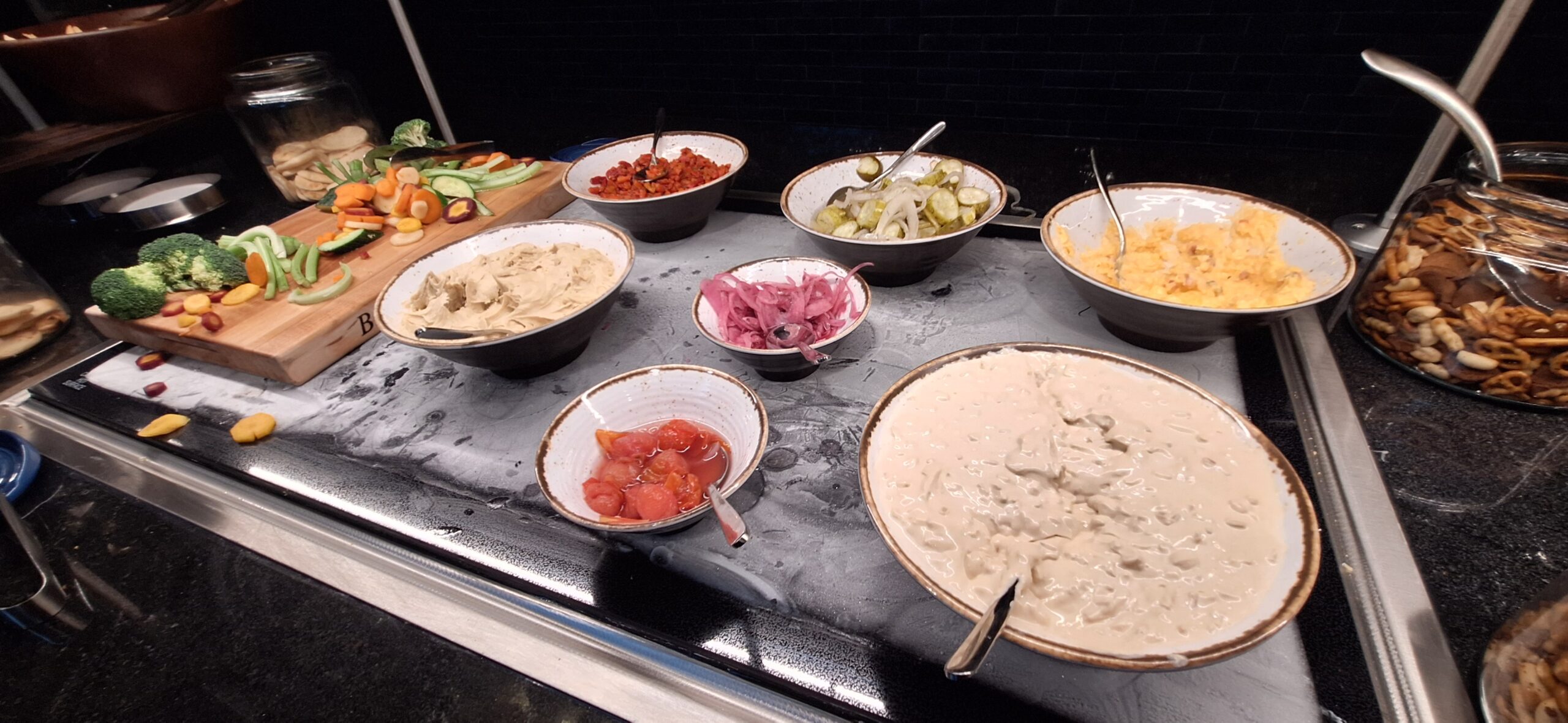 a table with bowls of food