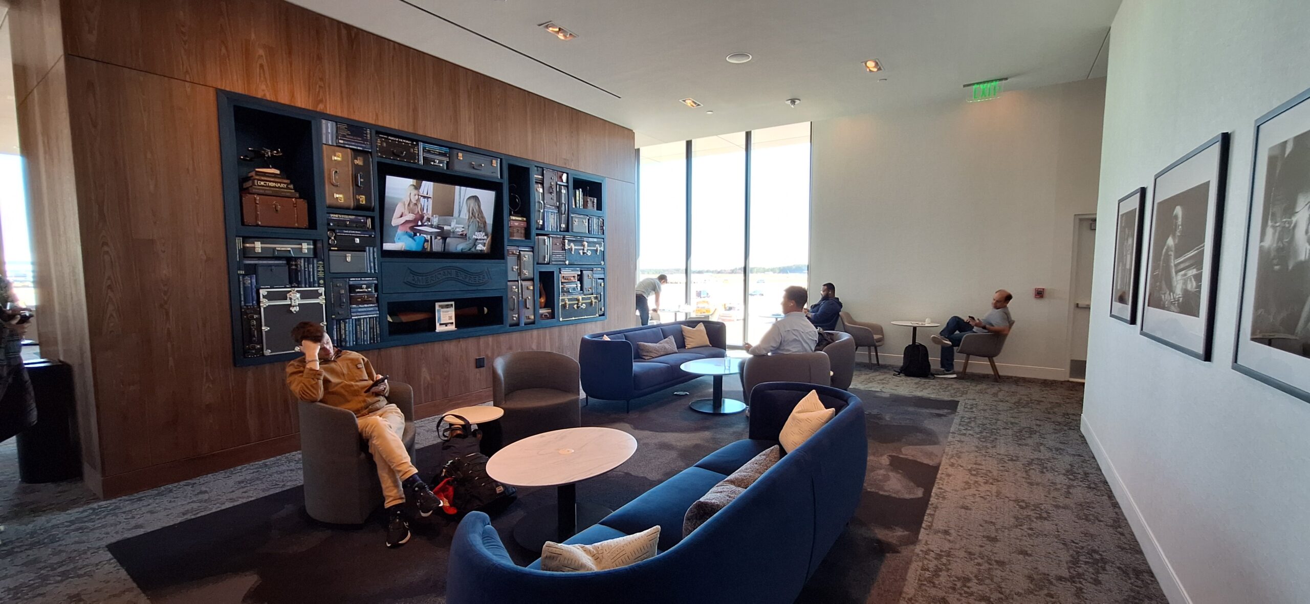 a group of people sitting in a lounge area