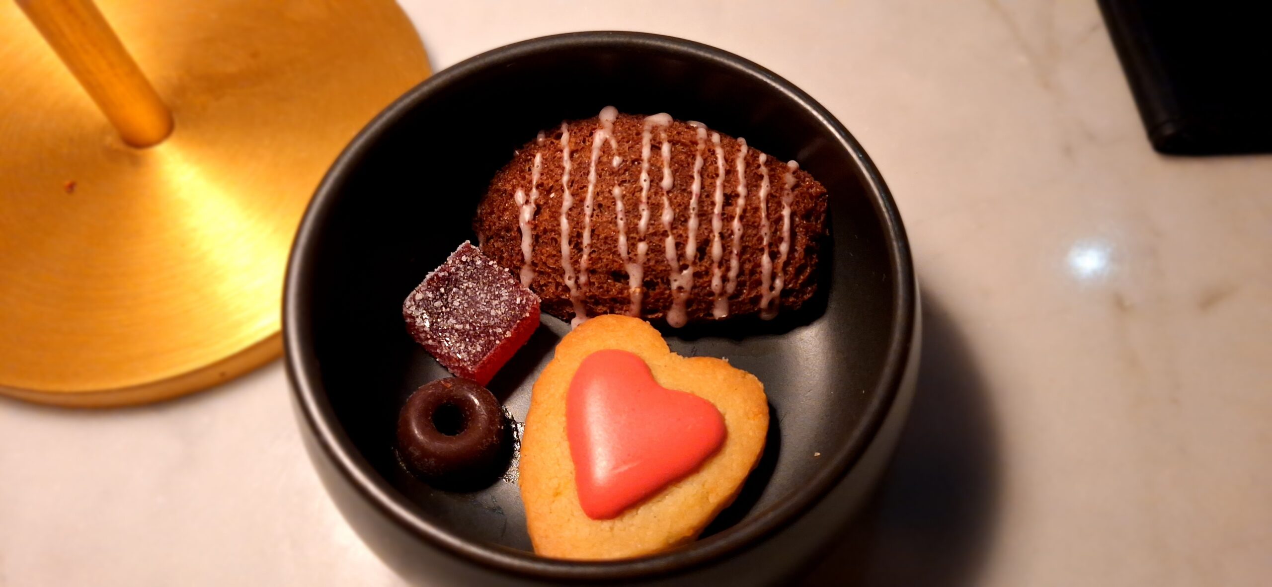 a bowl of cookies and candy