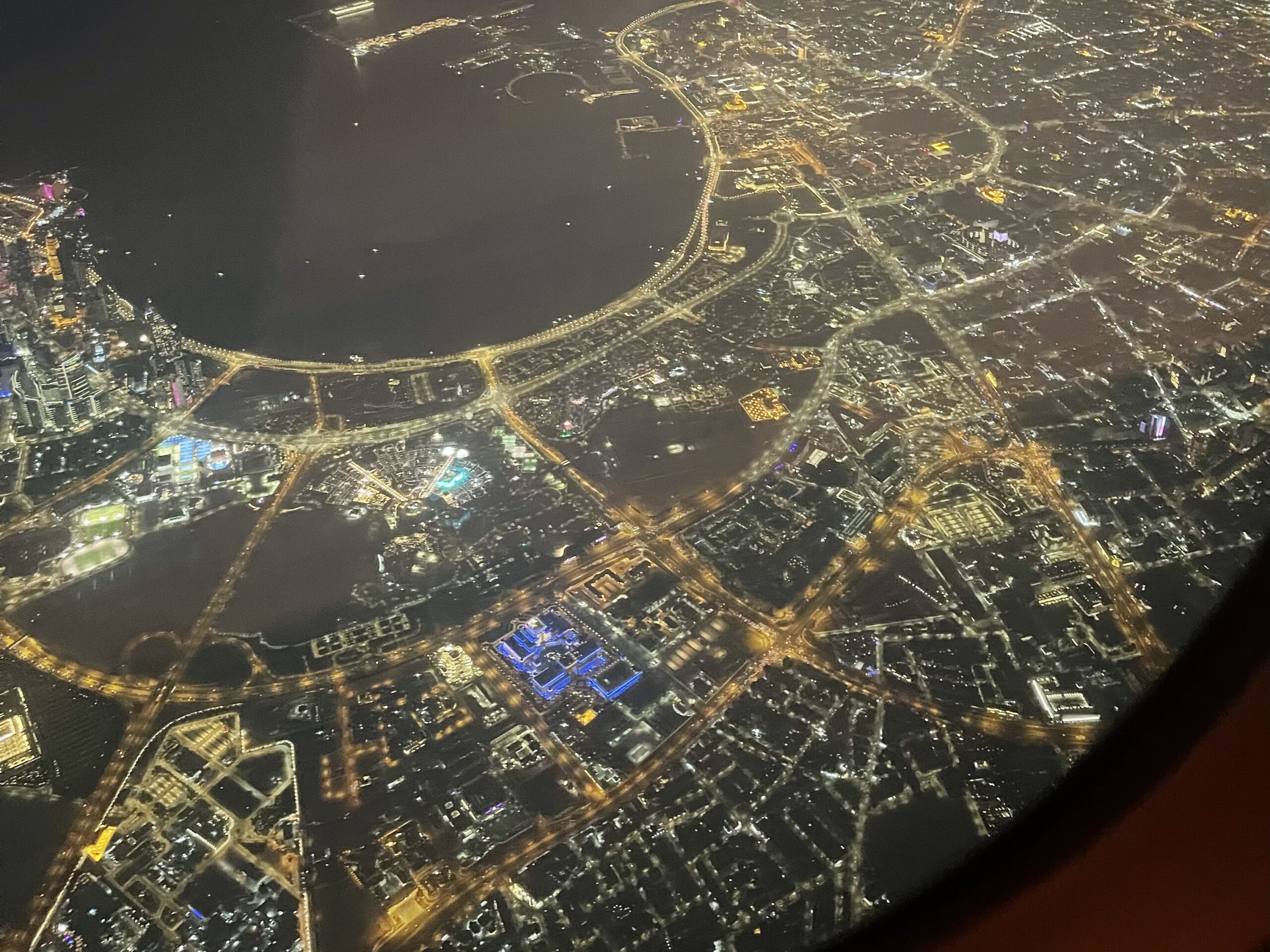 an aerial view of a city at night