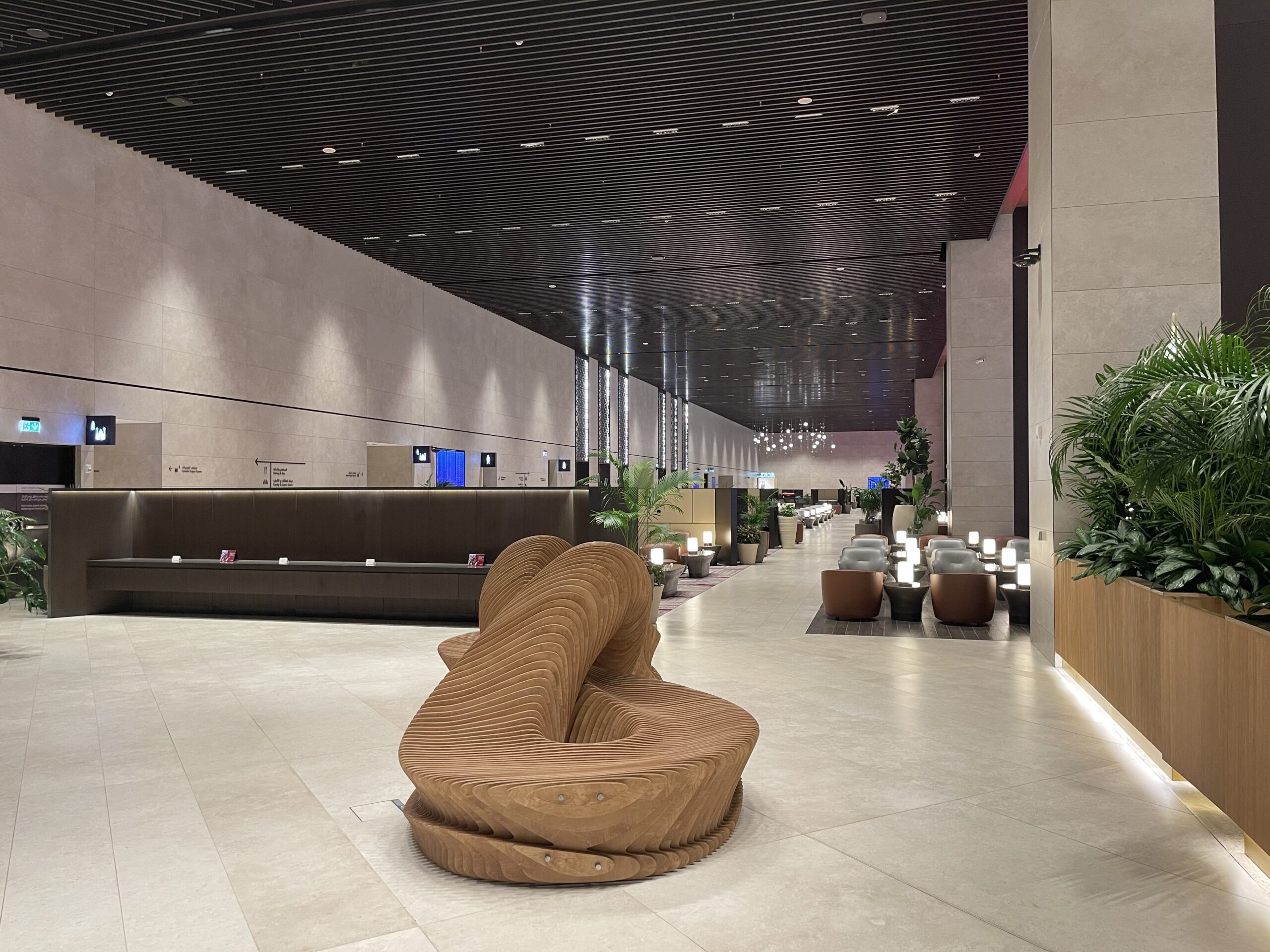 a large brown chair in a lobby