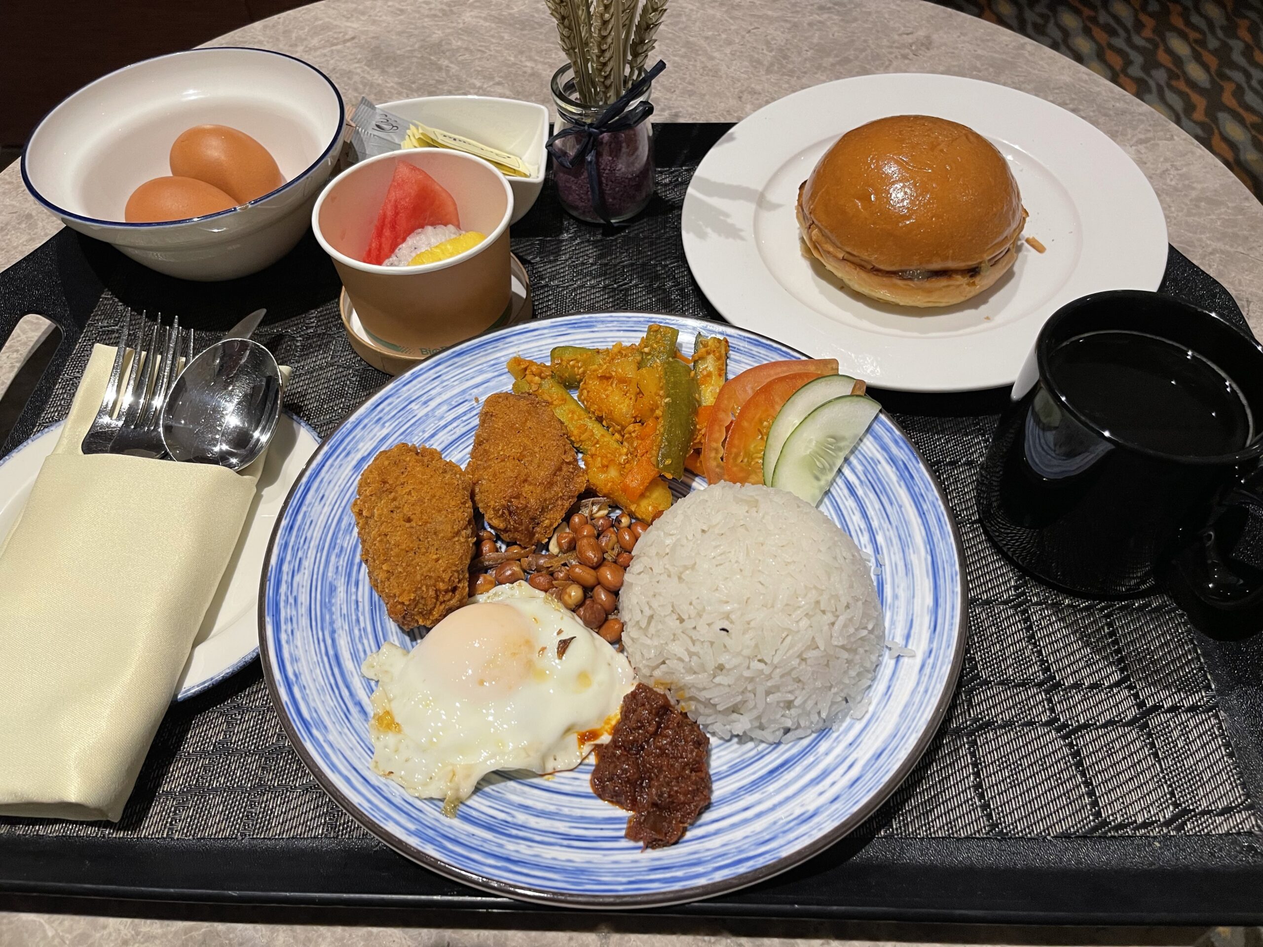 a plate of food on a tray