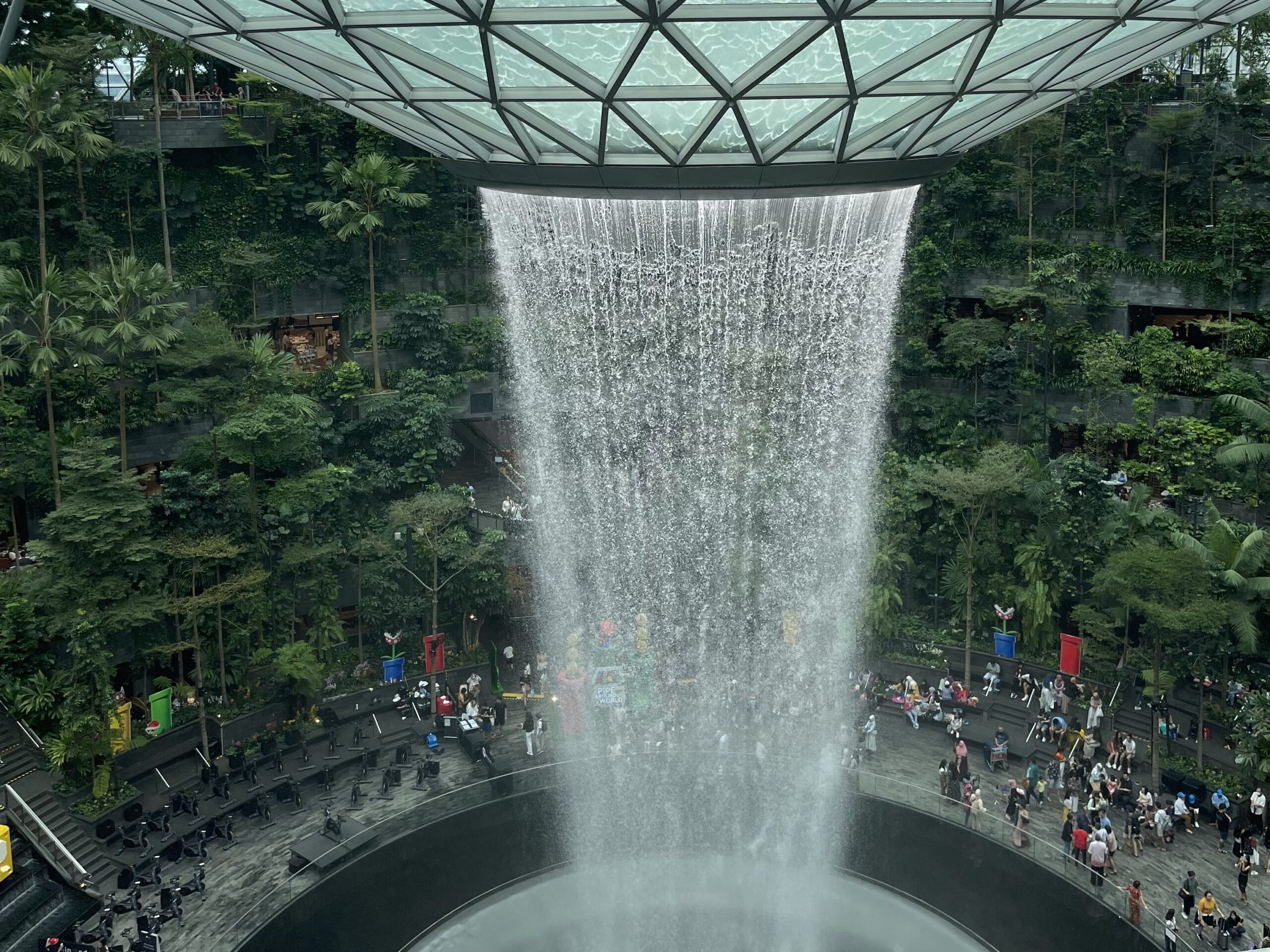 a waterfall in a glass dome