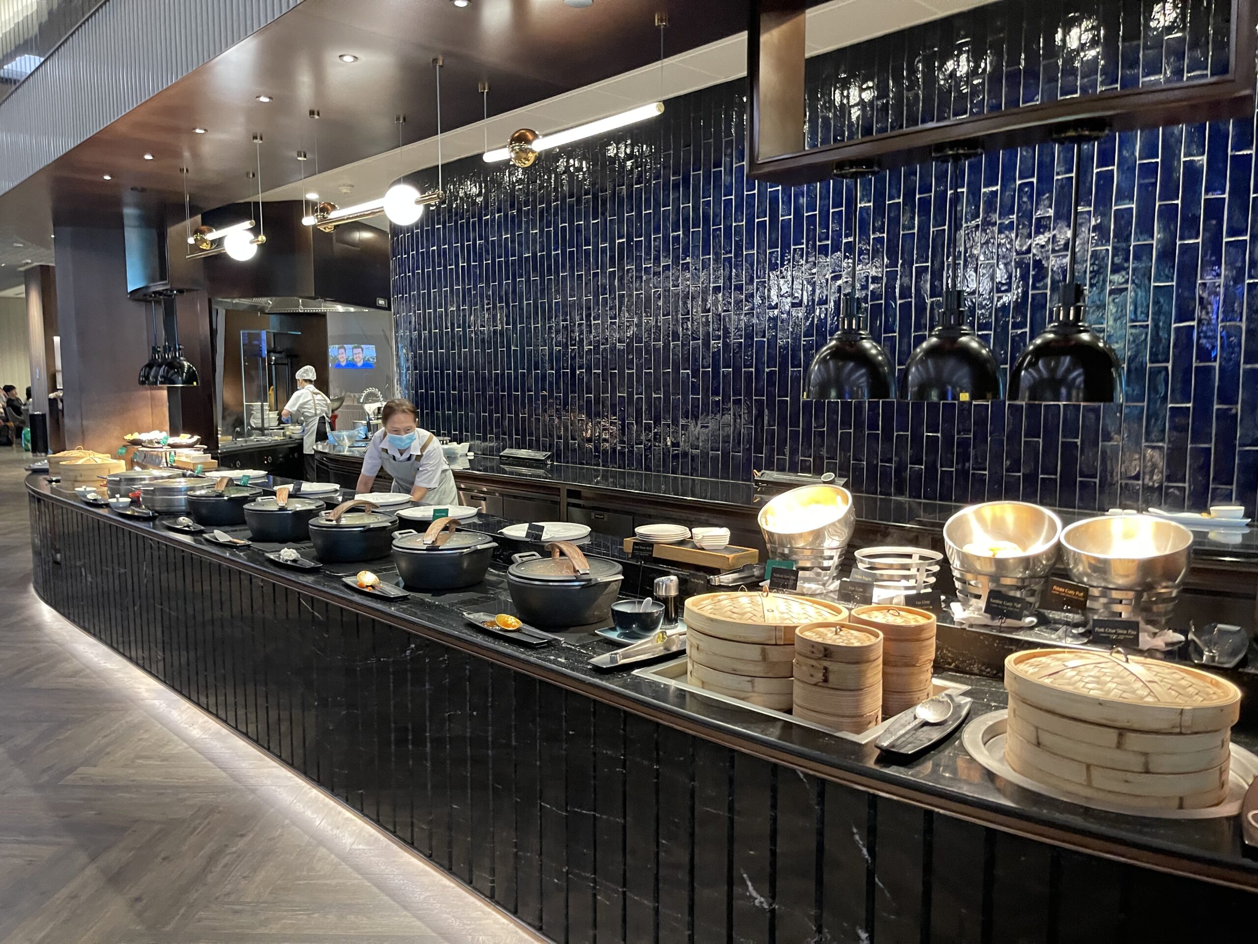 a kitchen with many pots and pans