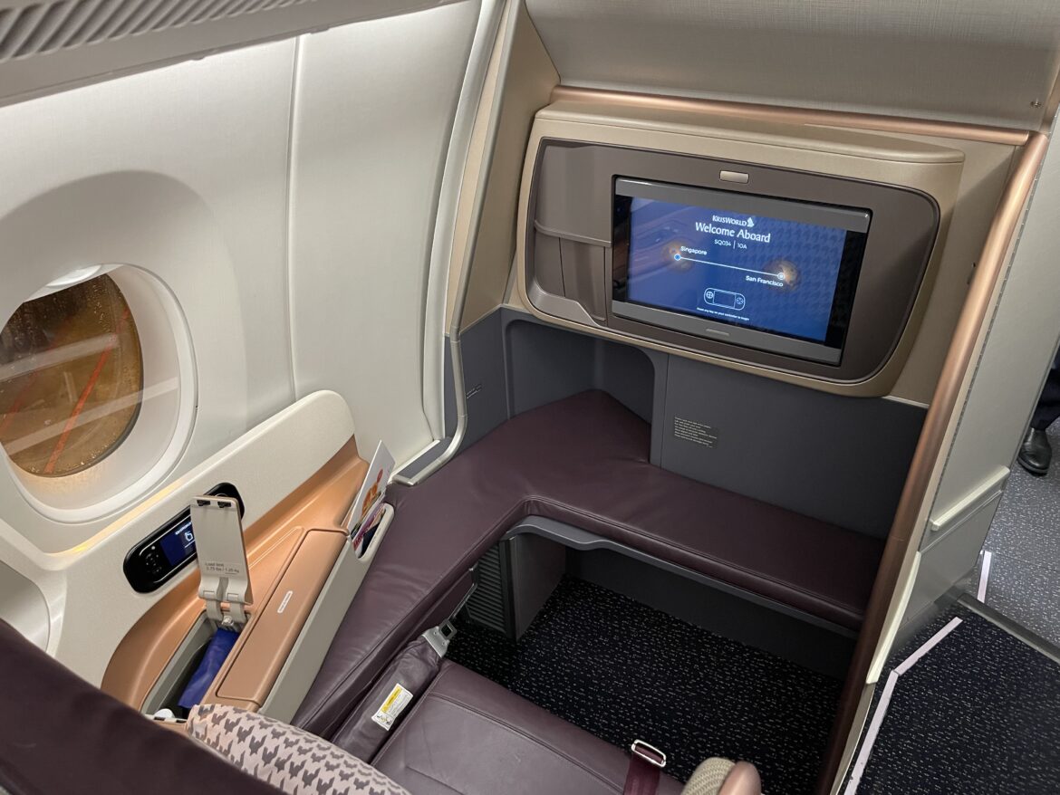 a tv in the middle of an airplane