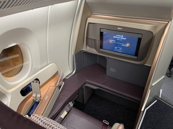 a tv in the middle of an airplane