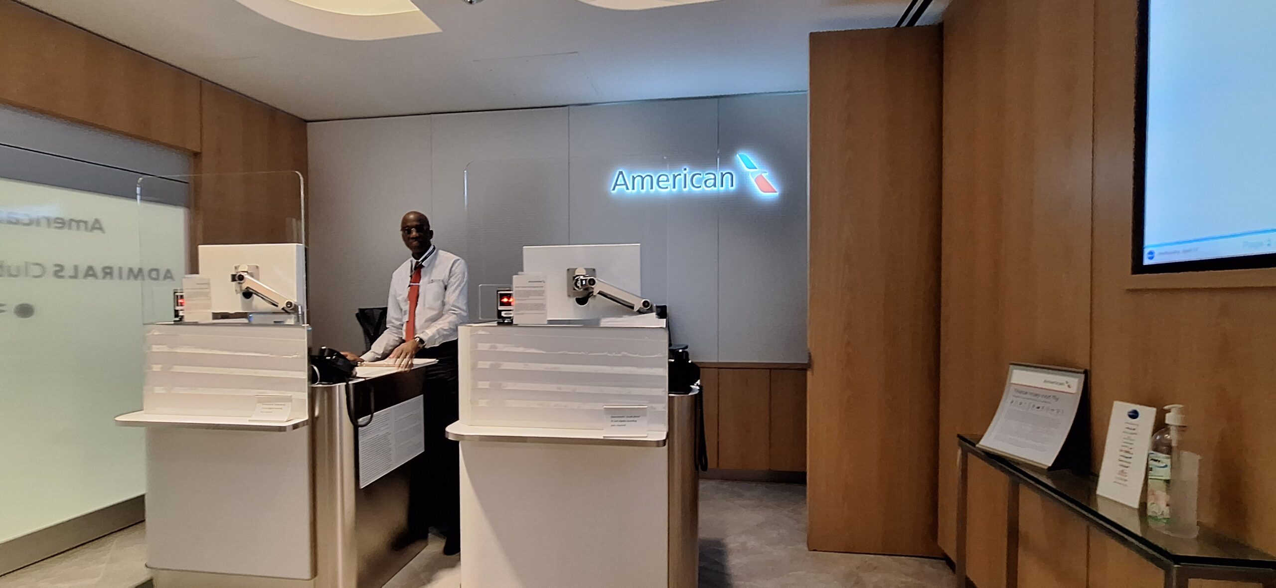 a man standing in front of a desk