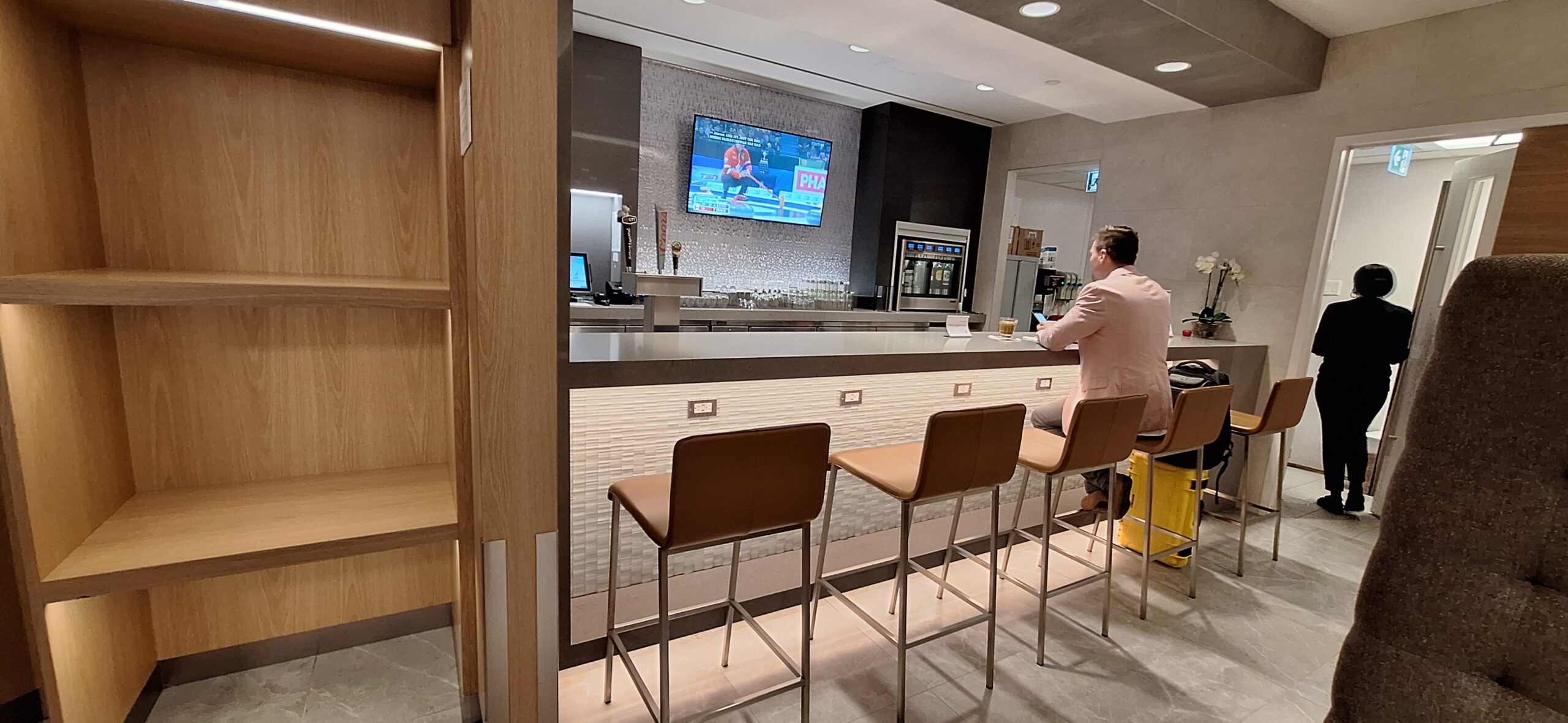 a man sitting at a bar