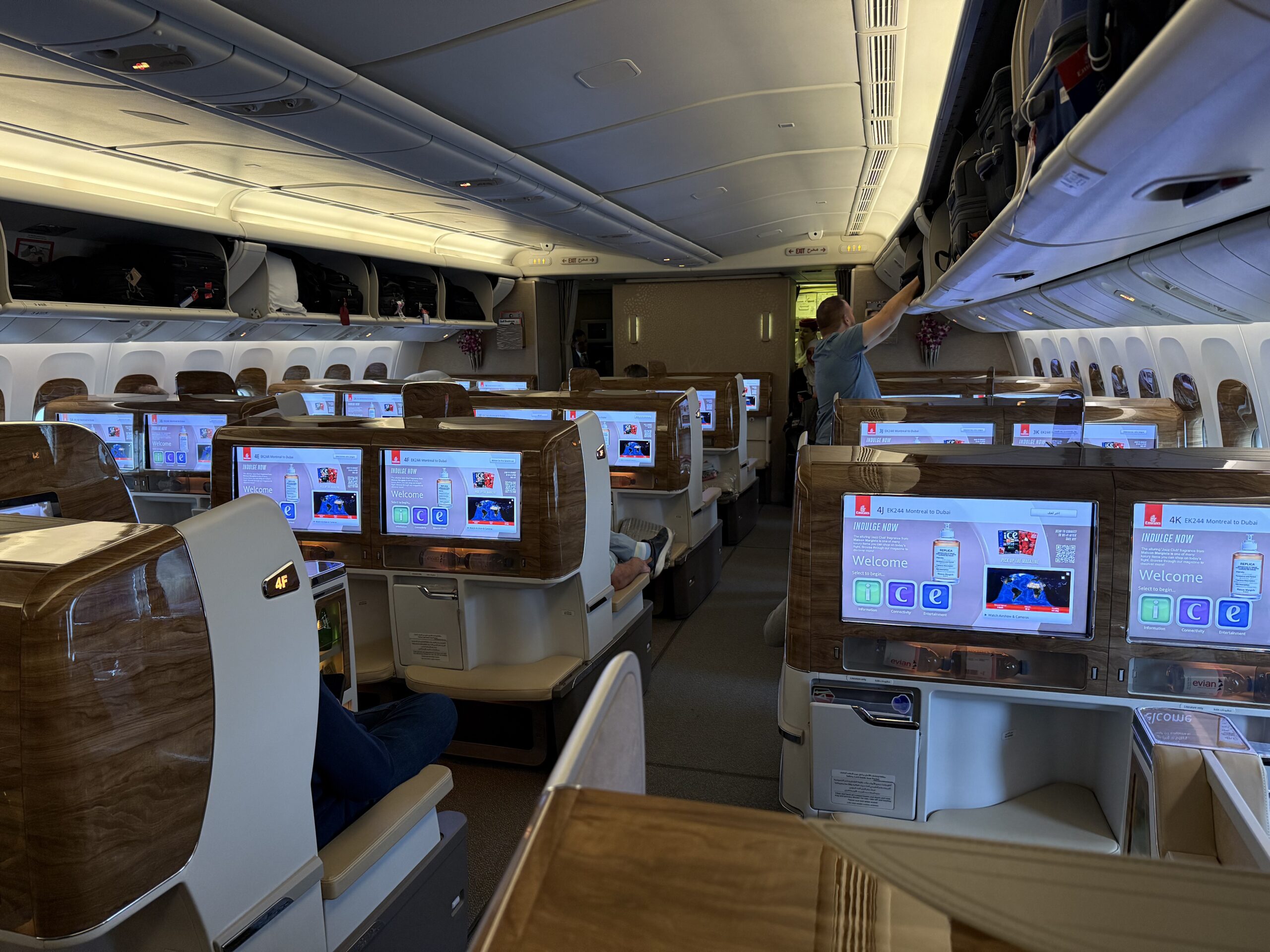 a person sitting in a chair in an airplane