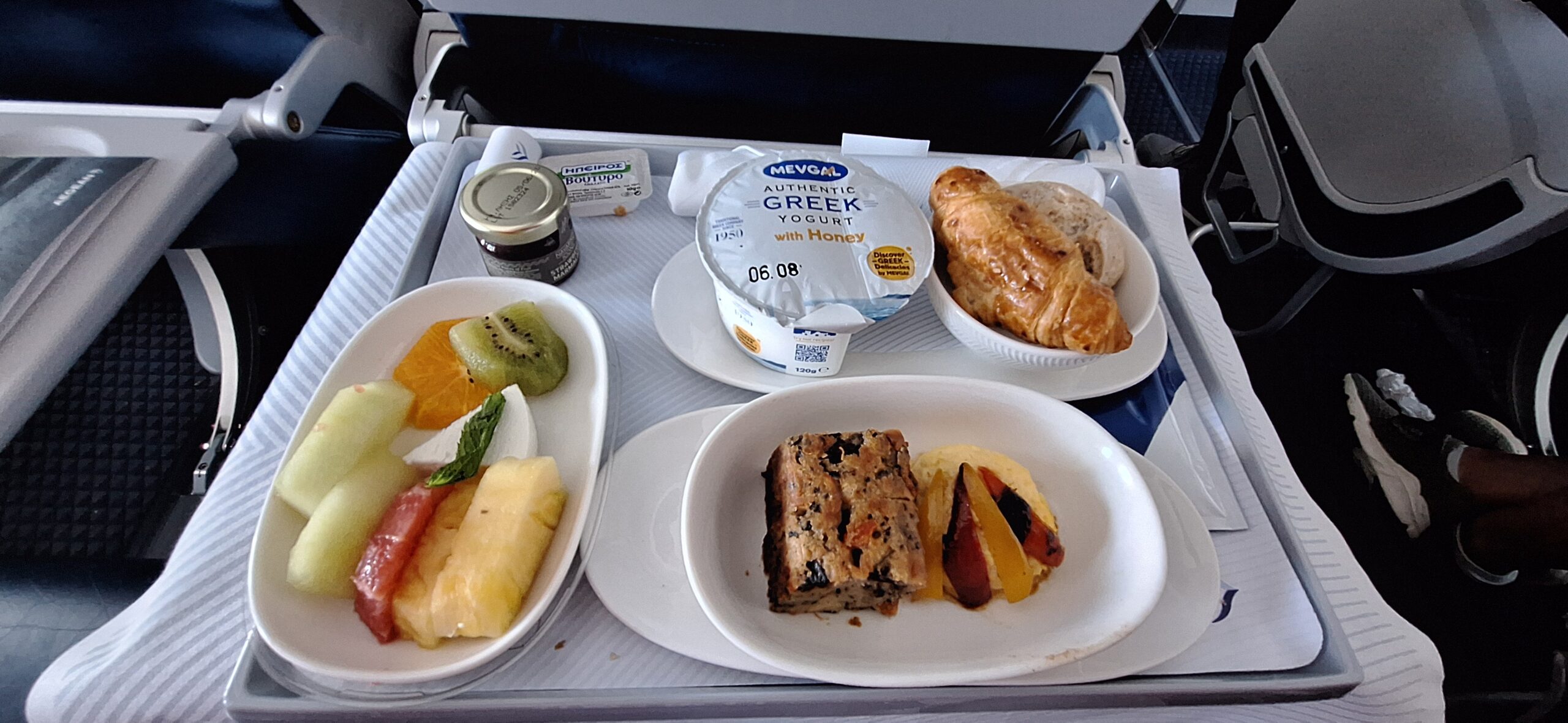 food on a tray on a plane