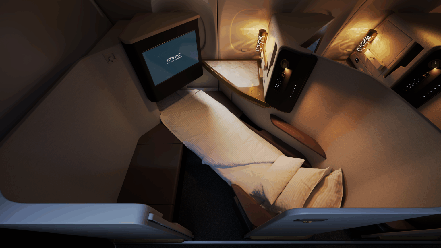 Etihad A321LR a bed in a room with a tv