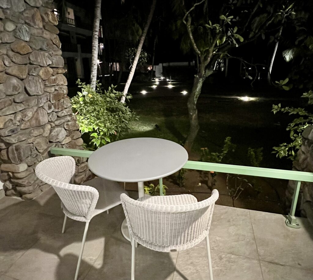 a table and chairs on a patio