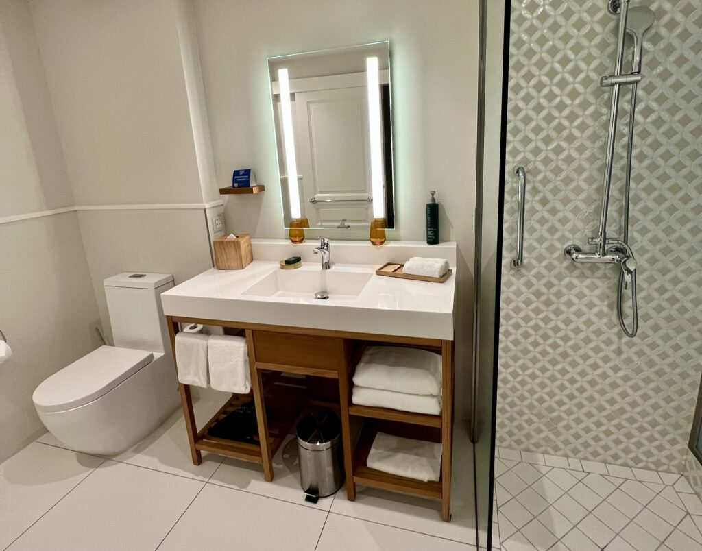 a bathroom with a mirror and a sink