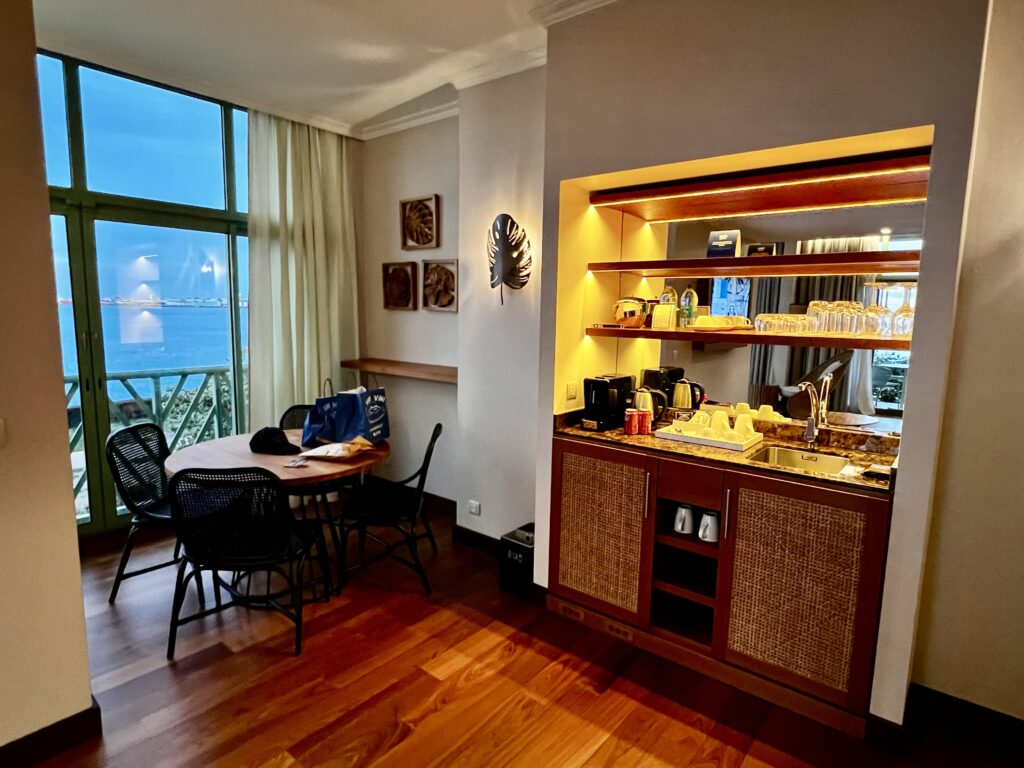 a room with a table and chairs