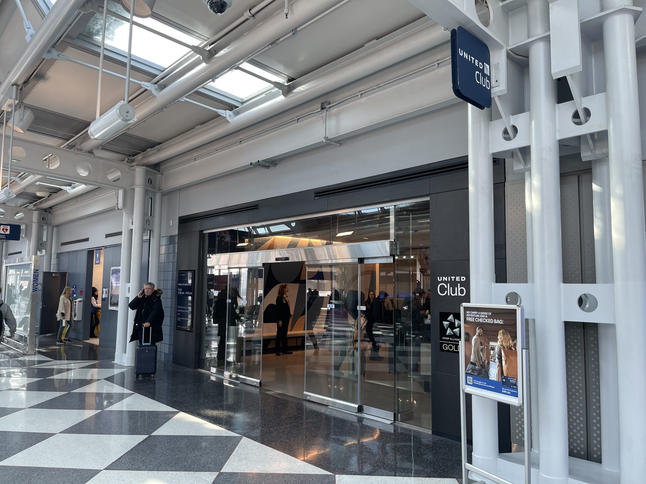 United Club Chicago ORD a glass doors in a building