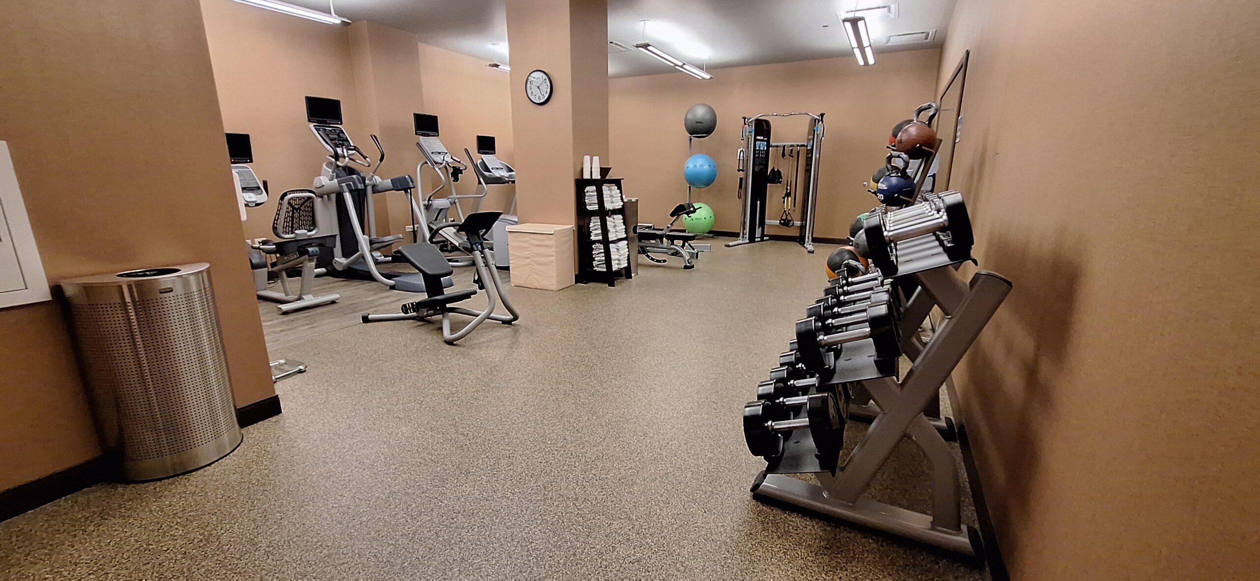 Cambria Hotel Chicago a room with exercise equipment