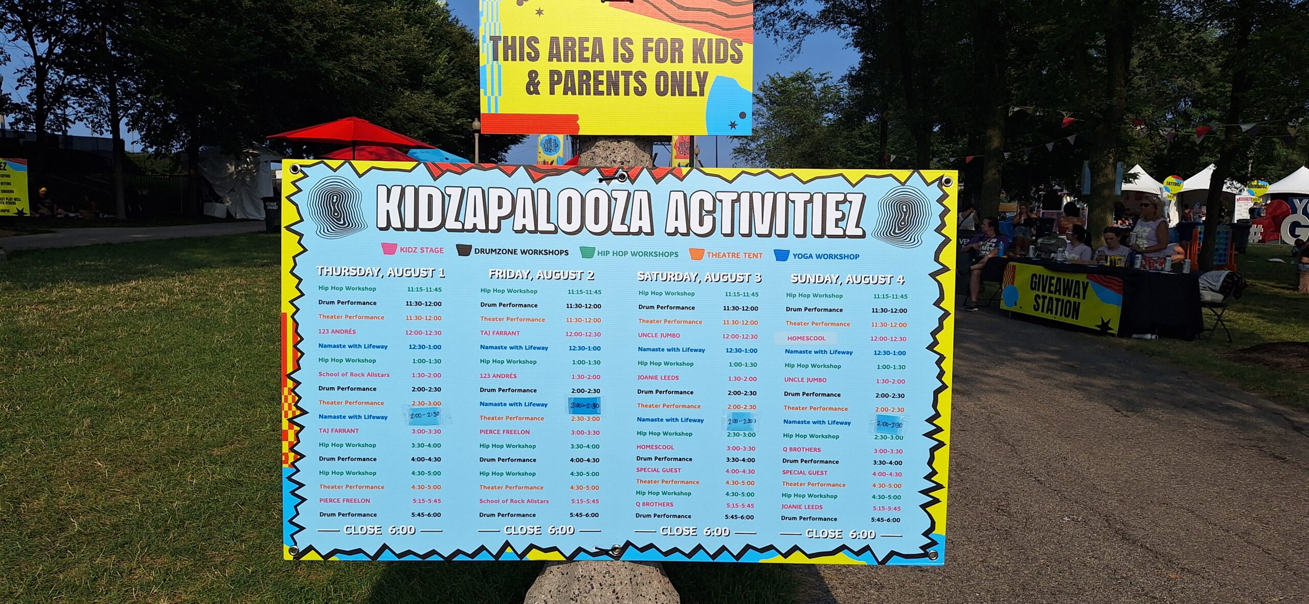 Lollapalooza Festival a sign with text on it
