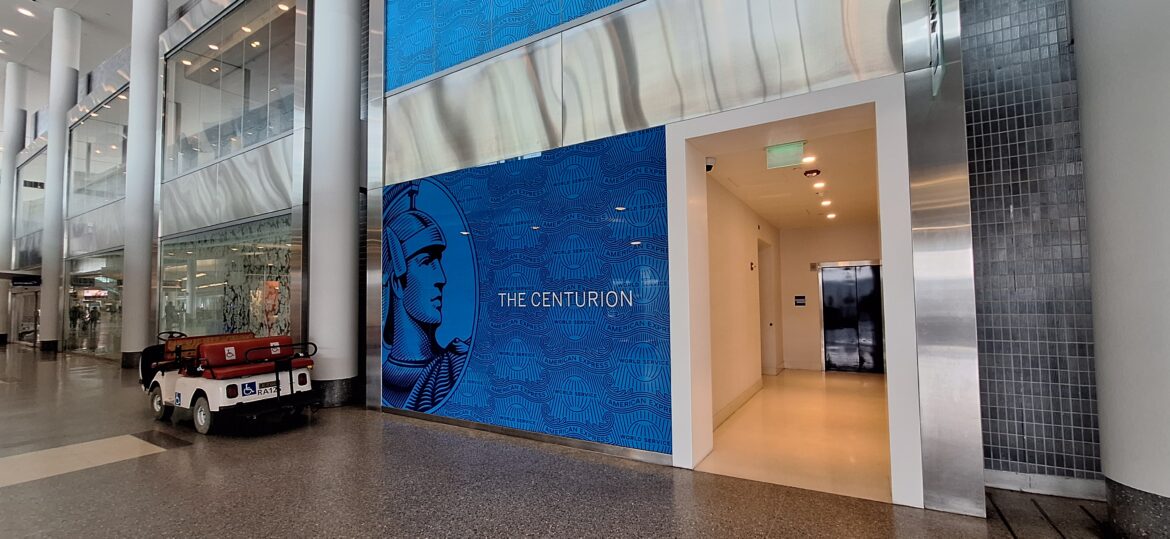 Philly Centurion – Entrance a blue wall with a picture on it