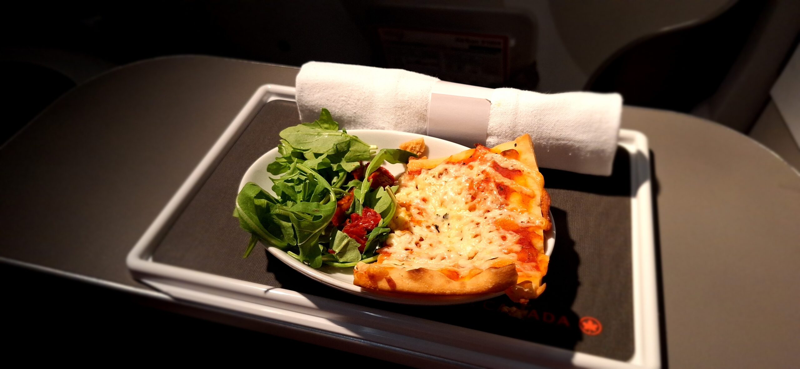 Premium Rouge a plate of food on a tray