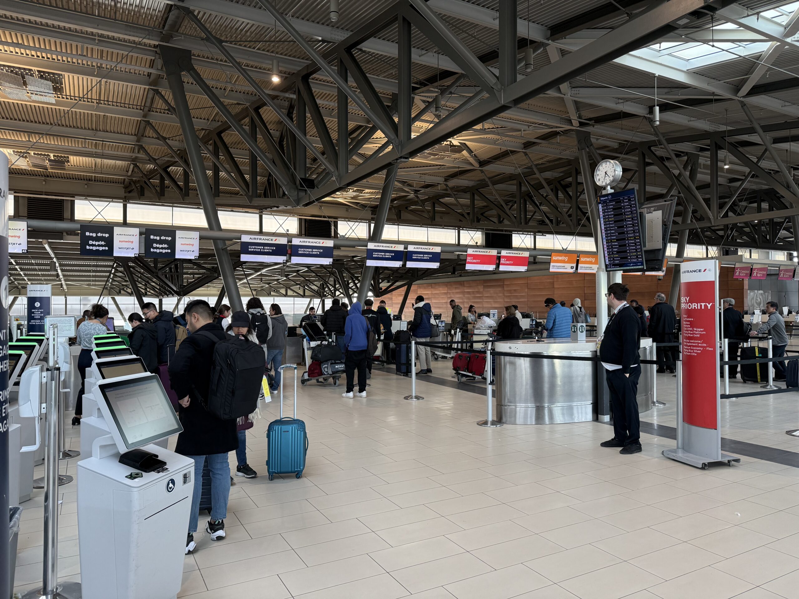 Air France Ottawa to Paris a group of people in a terminal