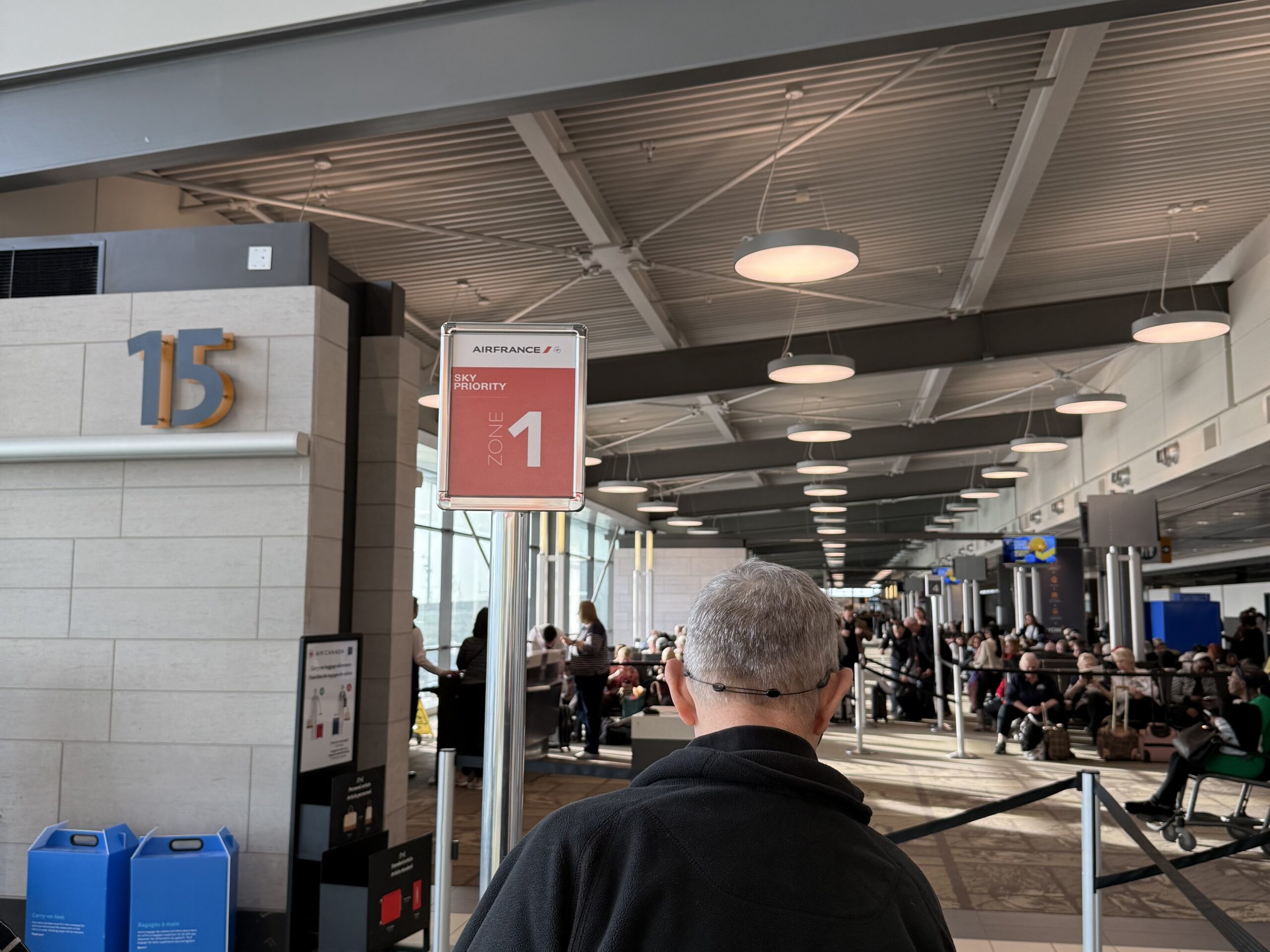 Air France Ottawa to Paris a man standing in a terminal