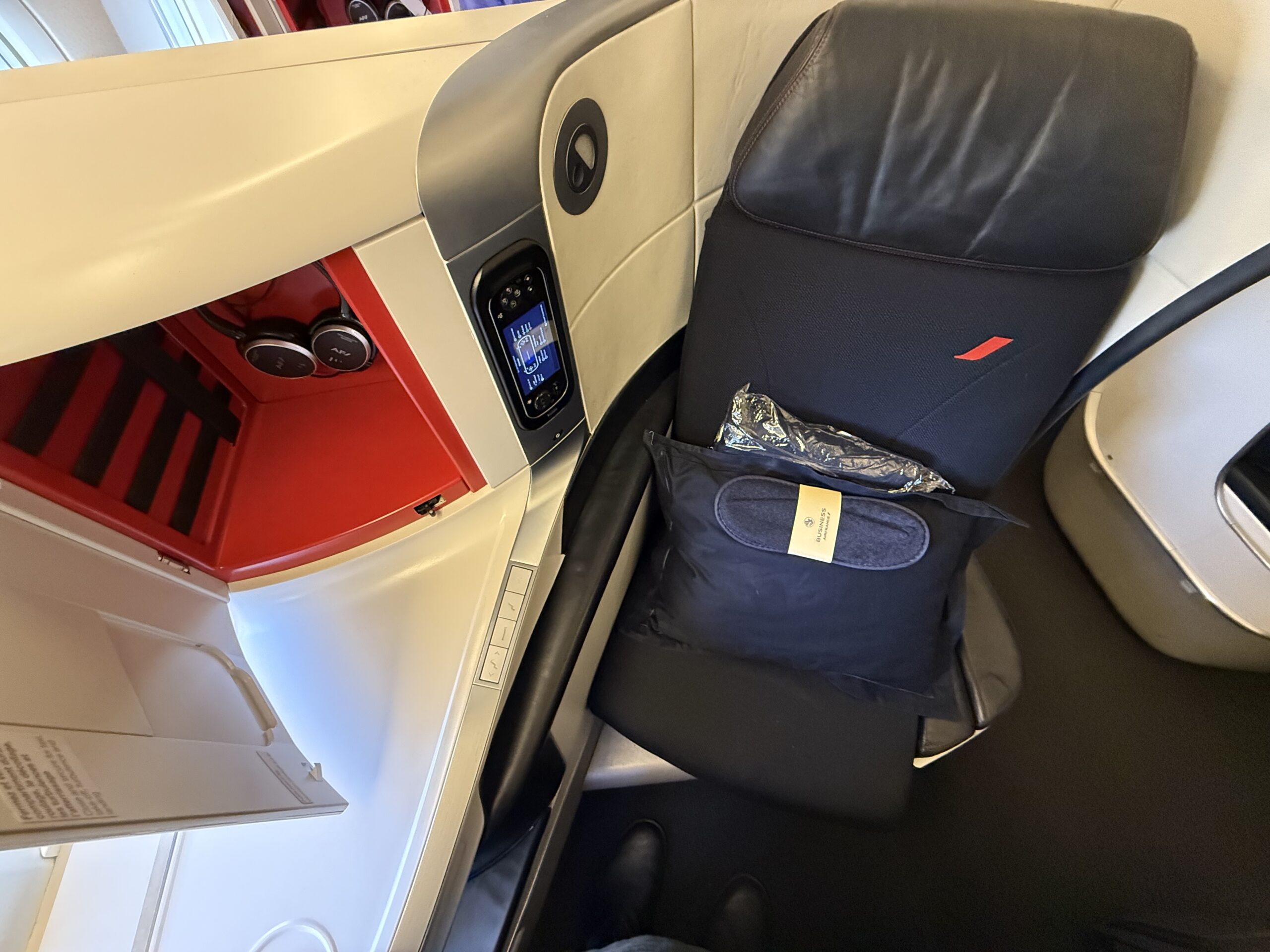 Air France Ottawa to Paris a seat with a pillow on it