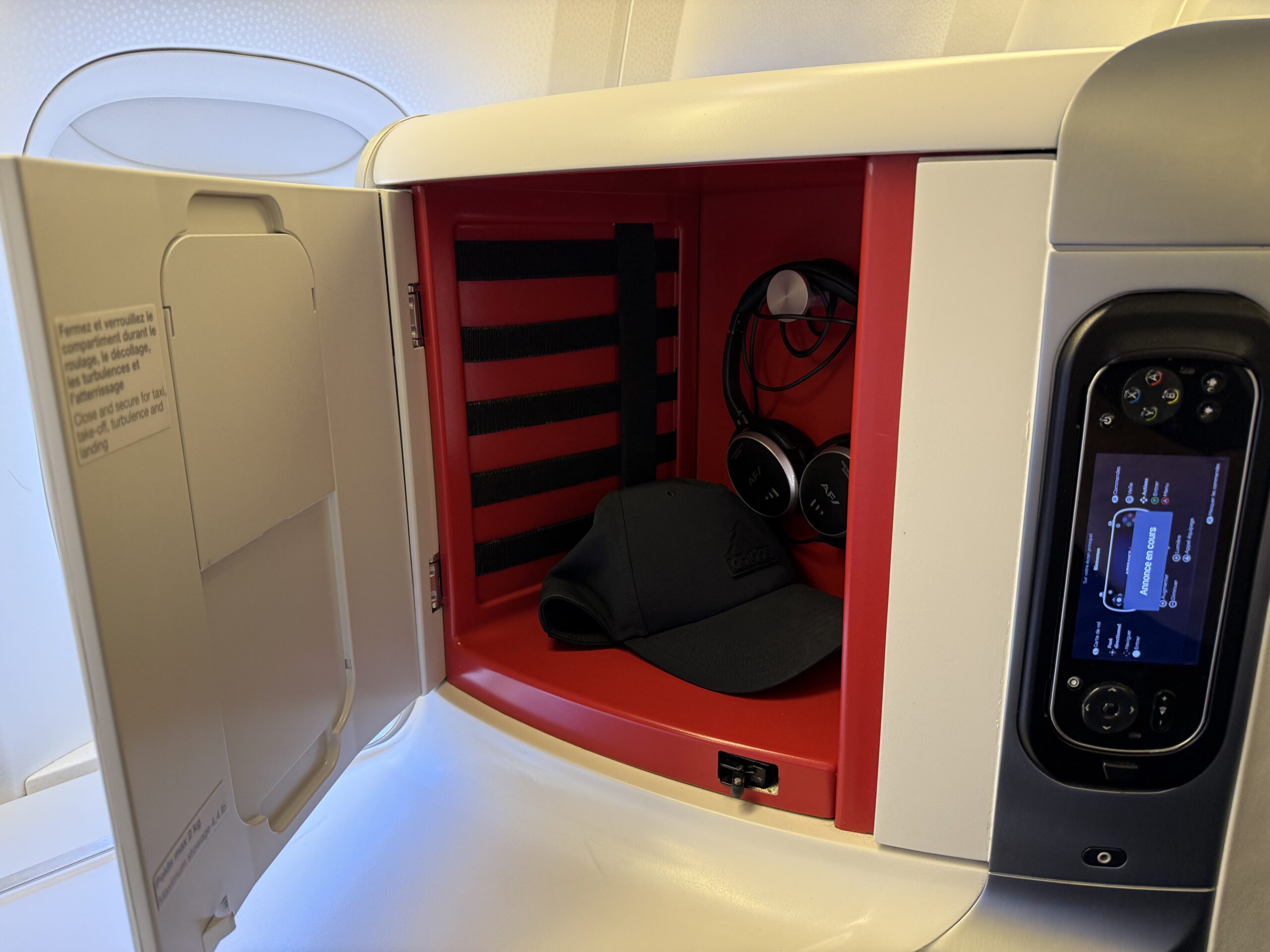 Air France Ottawa to Paris a hat in a small cabinet
