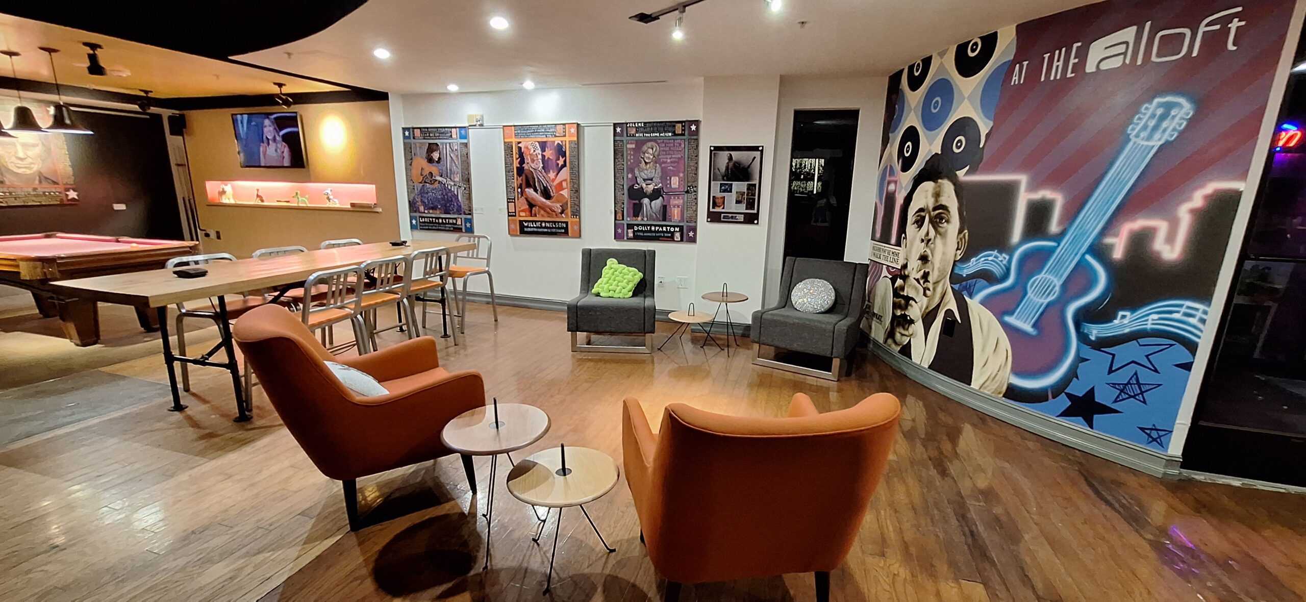 Marriott Aloft Nashville review a room with chairs and tables