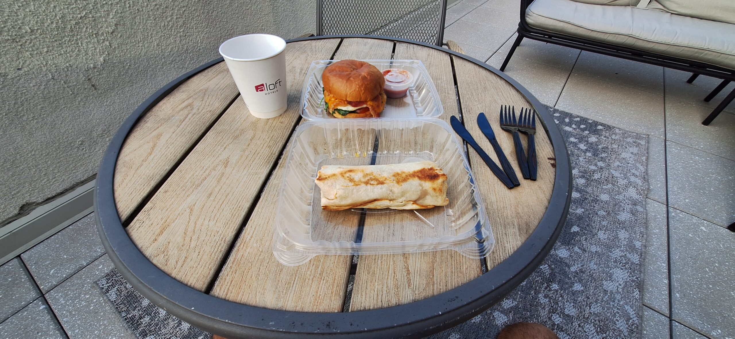 Marriott Aloft Nashville review a sandwich and a sandwich in a plastic container on a table