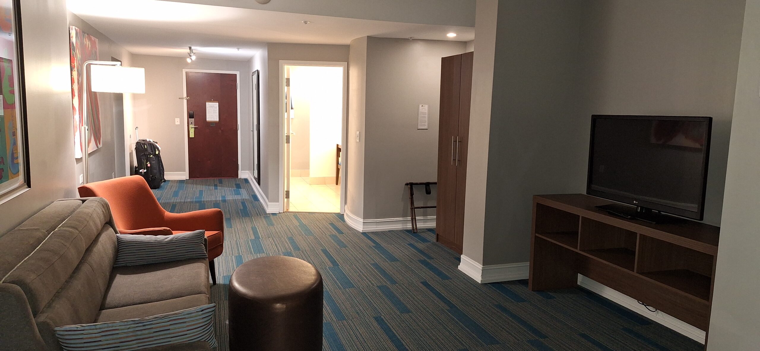 Marriott Aloft Nashville review a room with a door and chairs