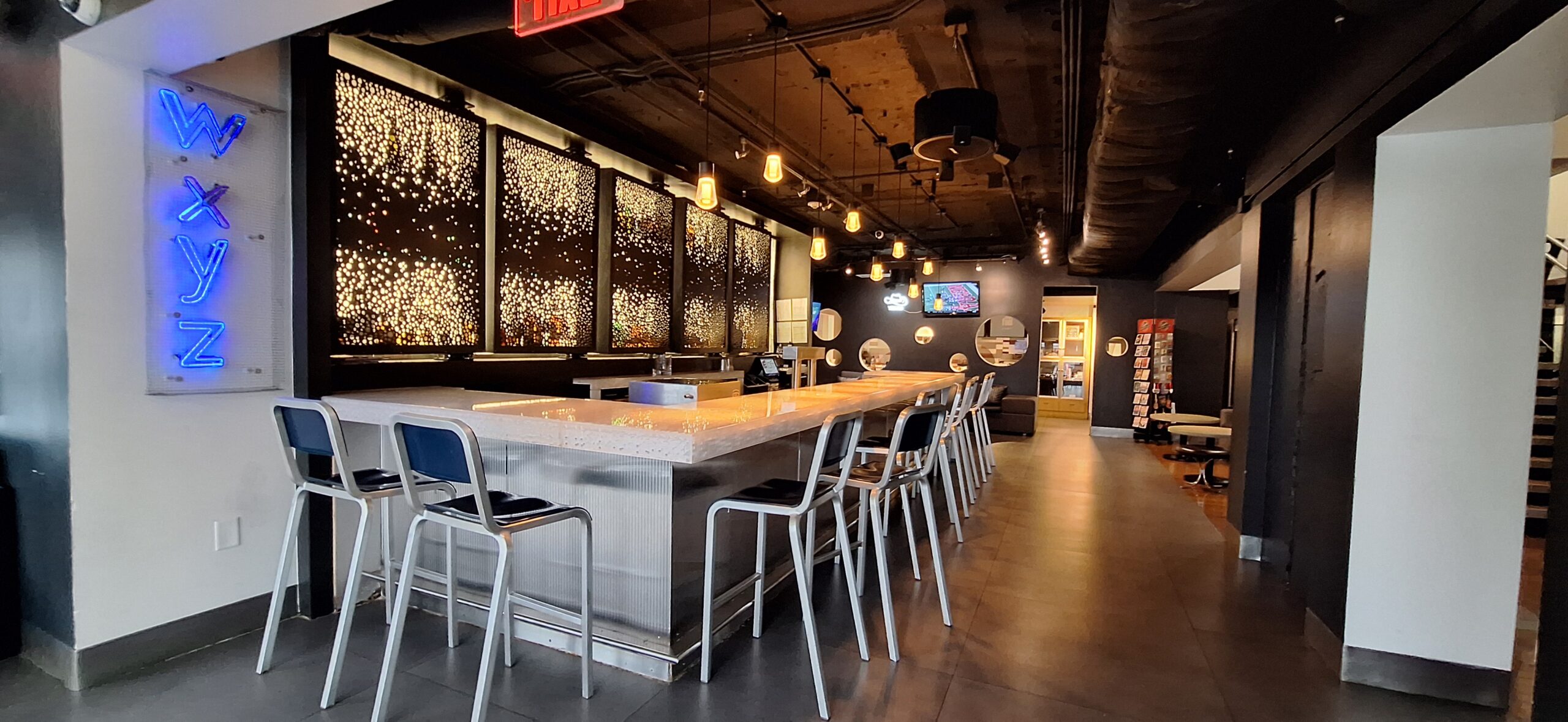 Marriott Aloft Nashville review a bar with chairs and lights