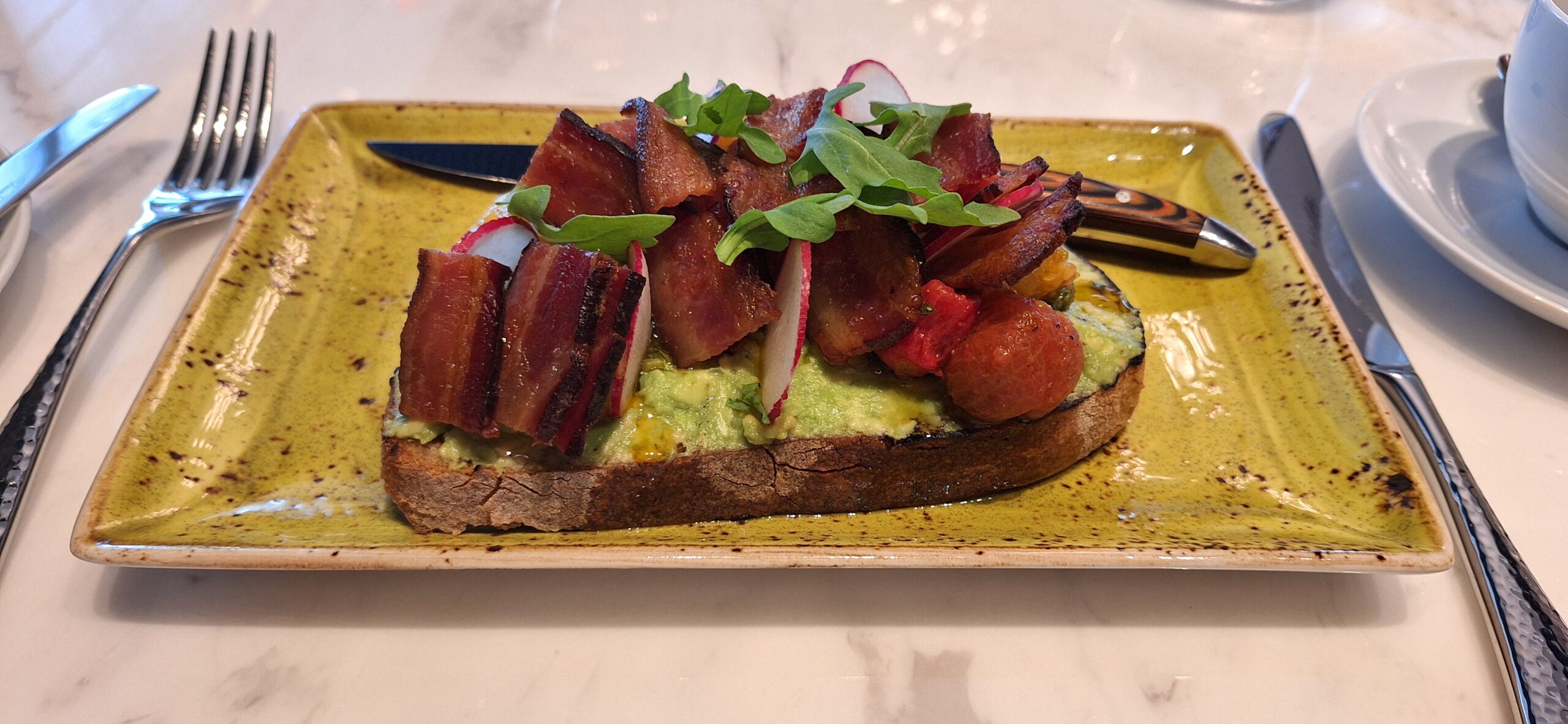 Conrad Nashville Review a plate of food on a table