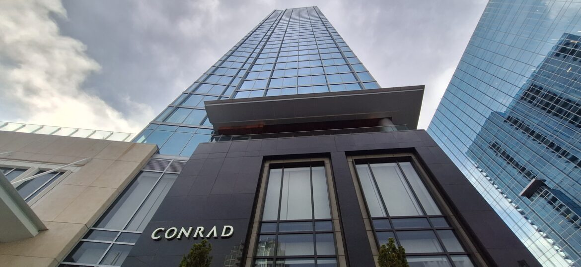 a tall building with a sign on it