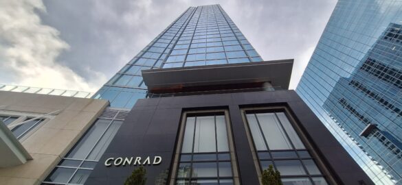 a tall building with a sign on it