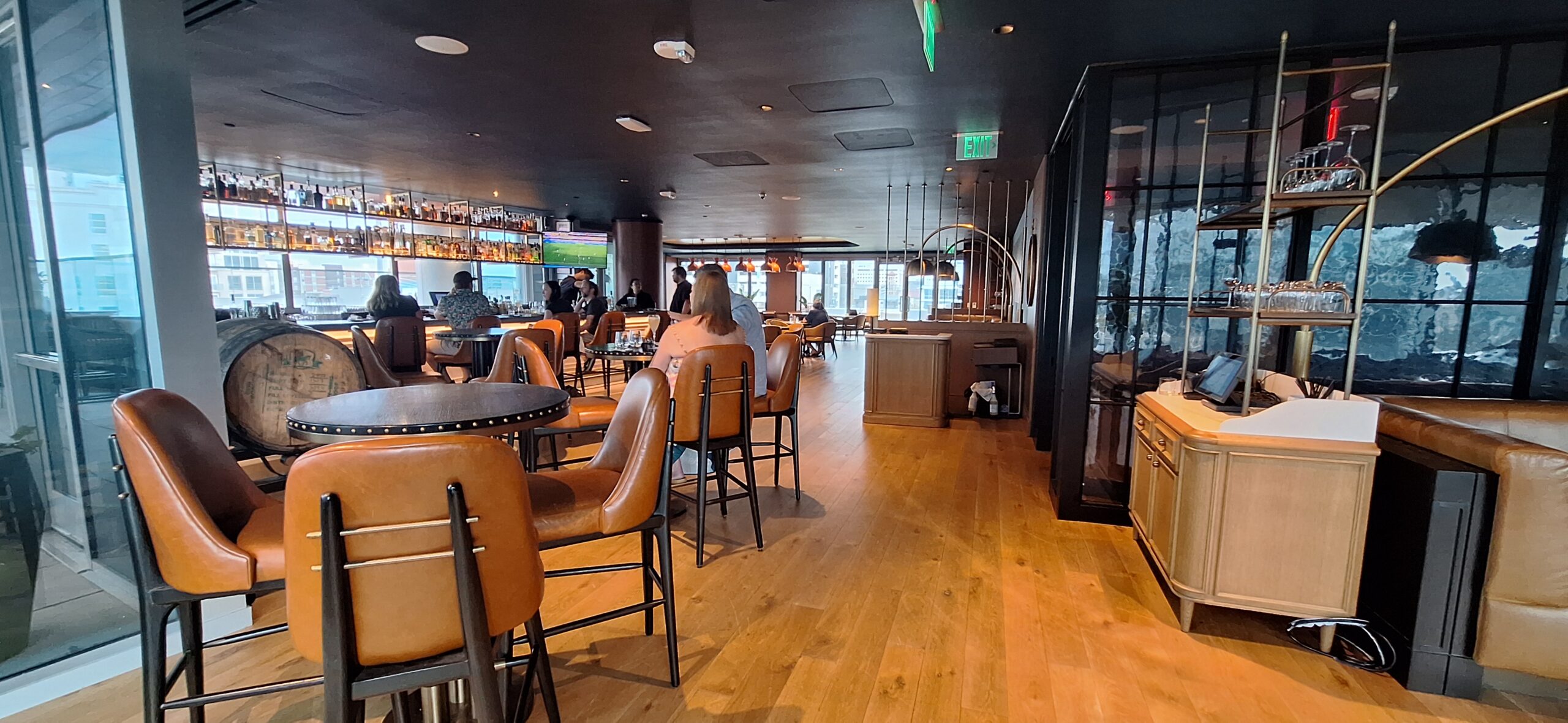 Conrad Nashville Review a room with tables and chairs