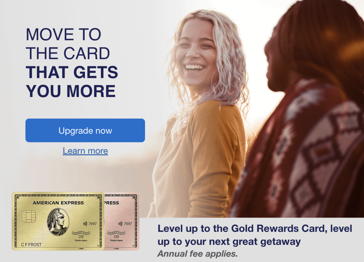 a woman laughing and a man looking at a card