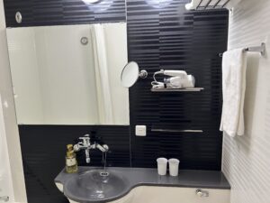 a bathroom with a sink and a mirror