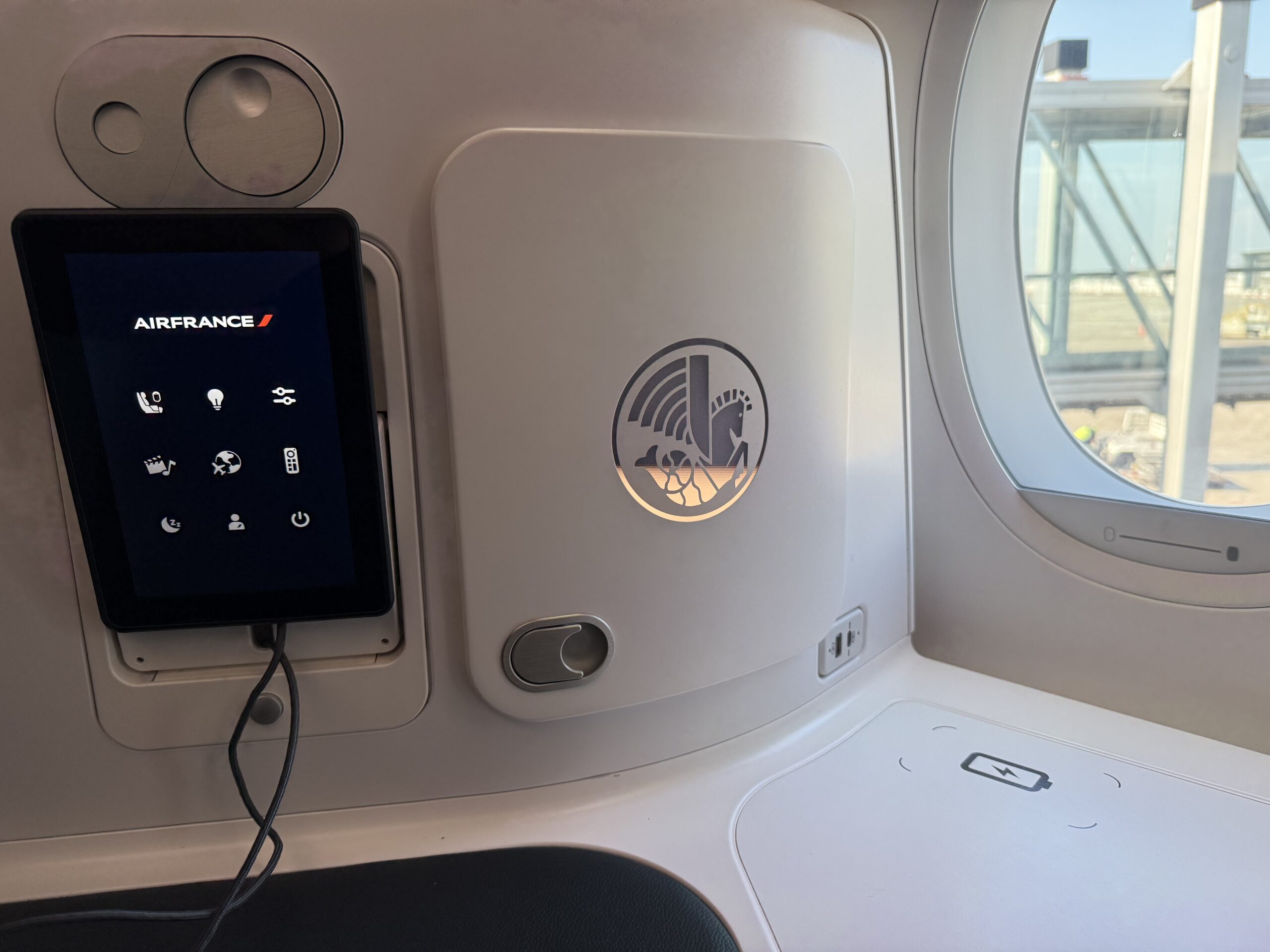 a screen on the side of a plane