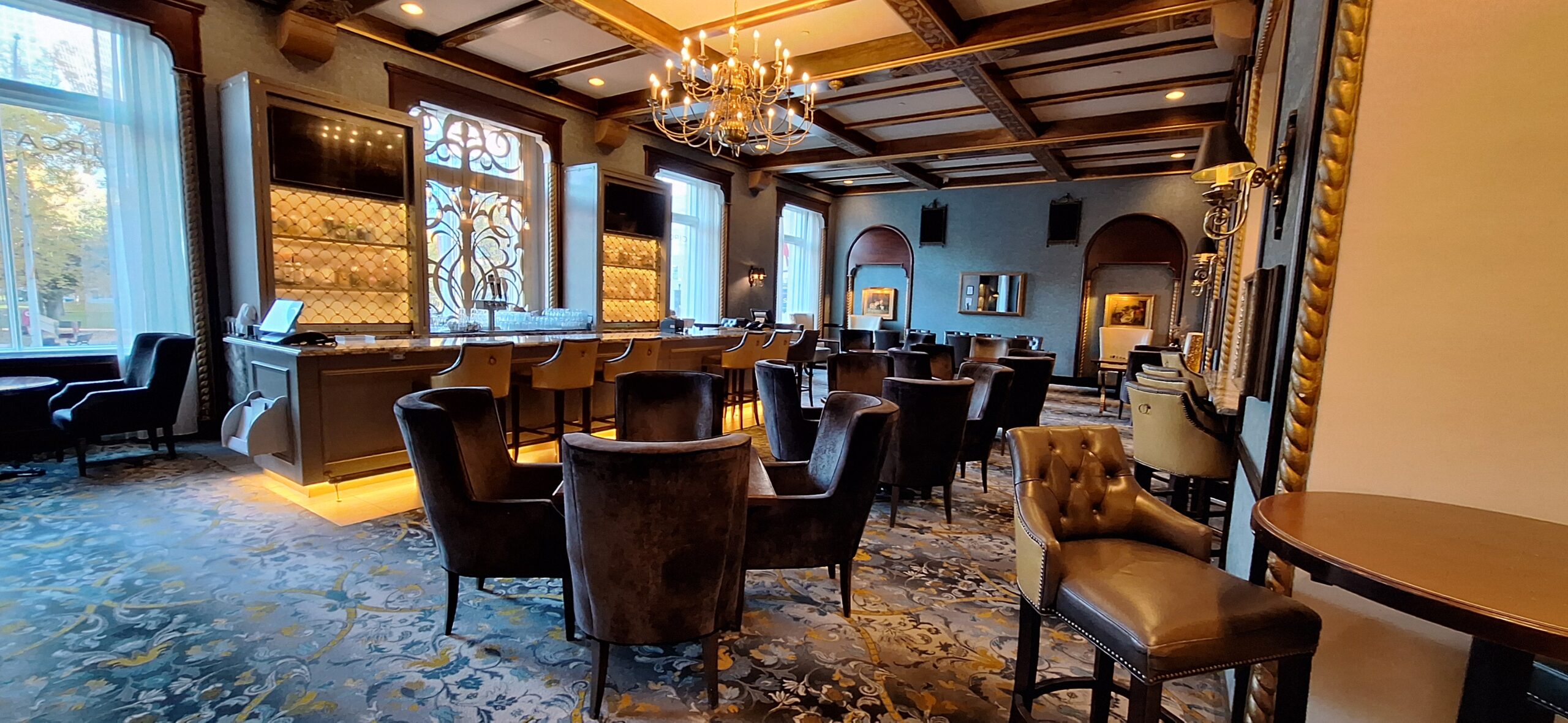 a room with chairs and tables