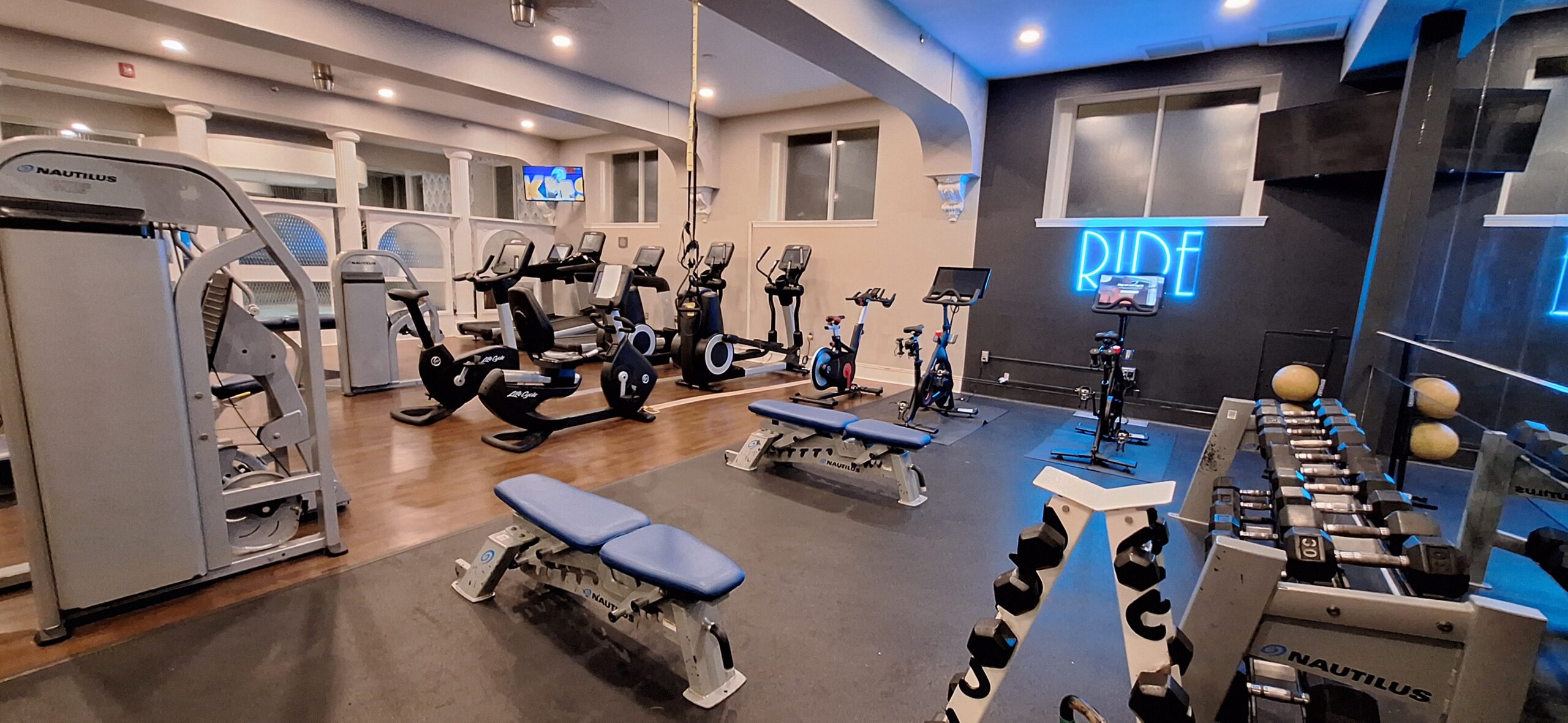 a room with exercise bikes and exercise equipment
