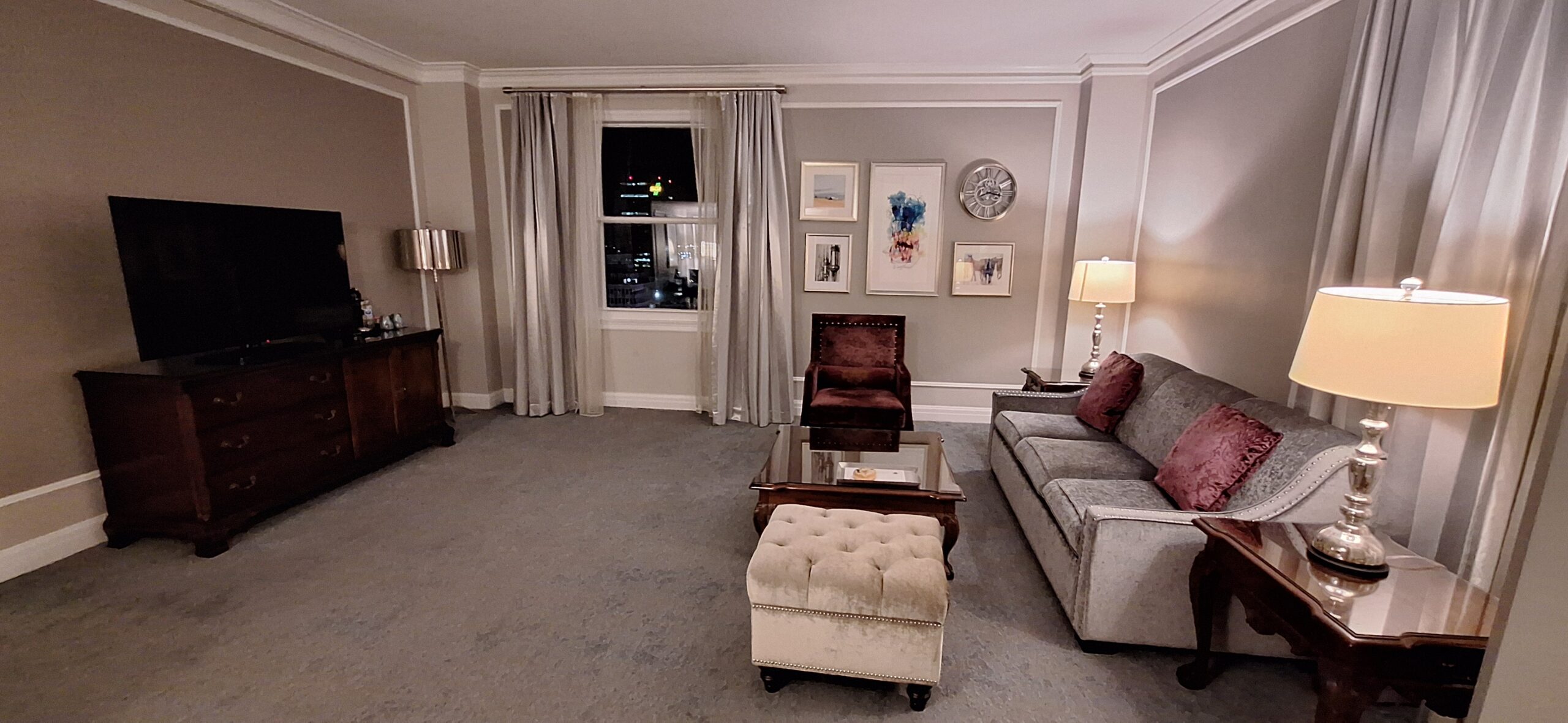 a living room with couches and coffee table