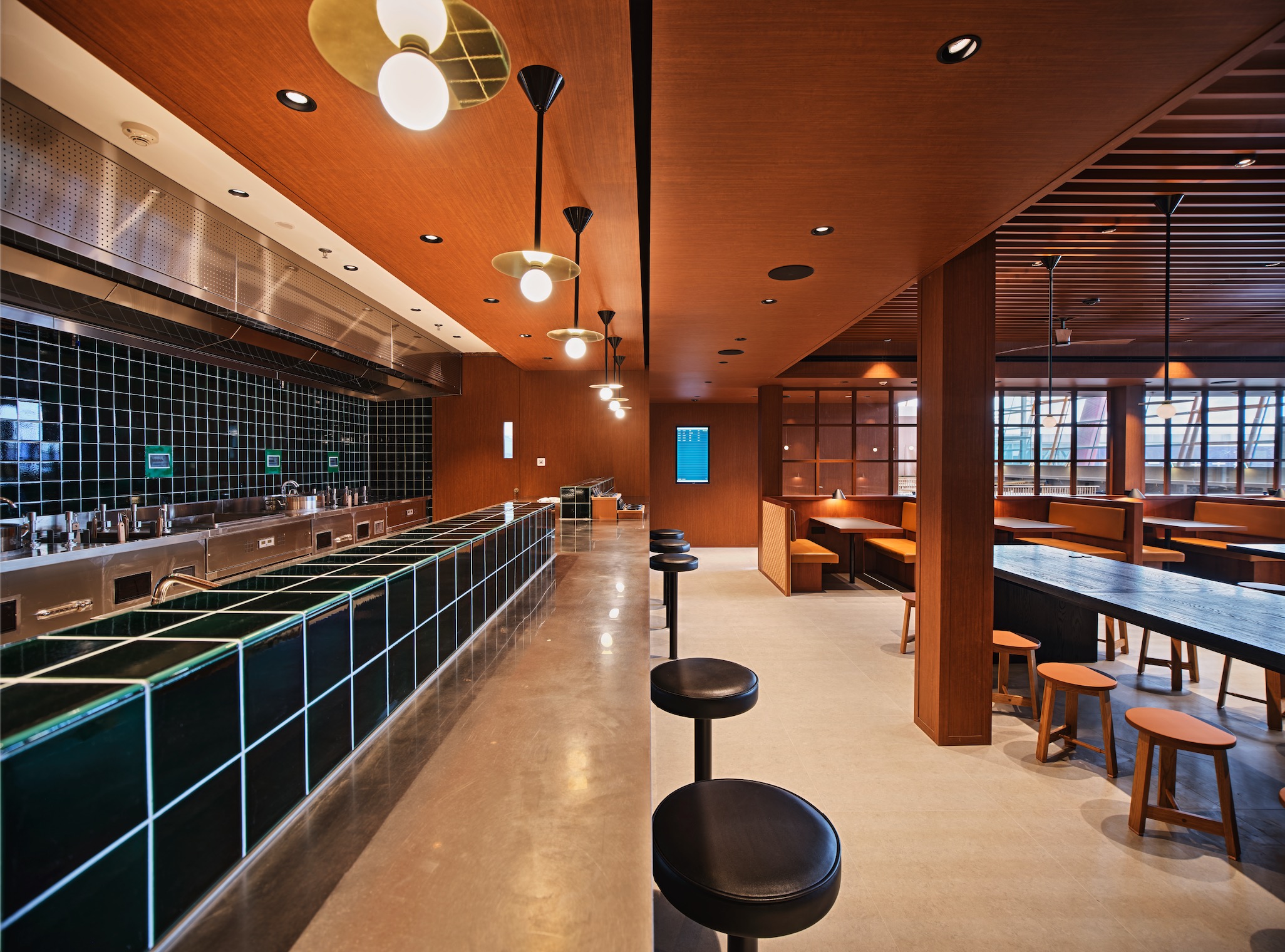 a room with stools and tables