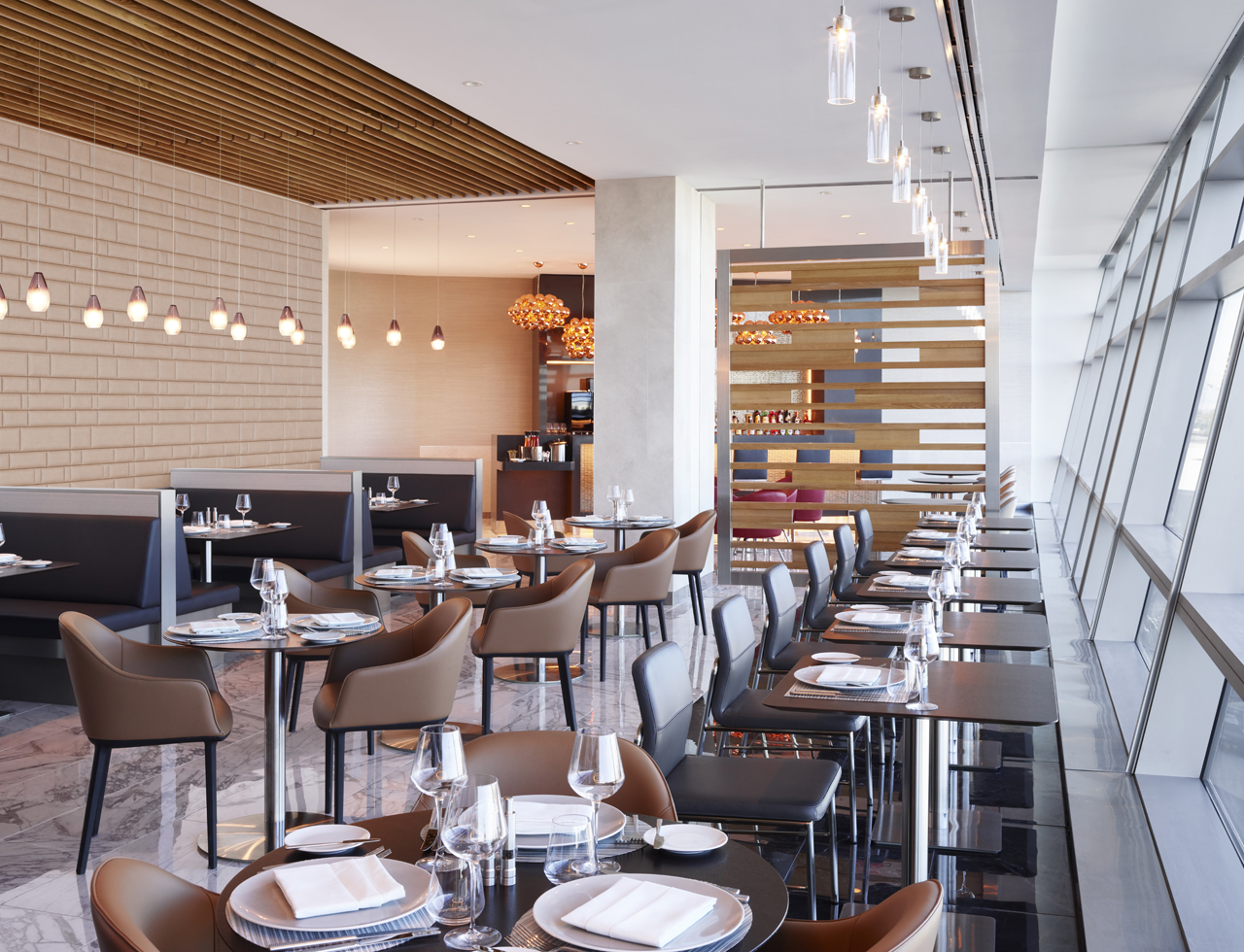 a restaurant with tables and chairs