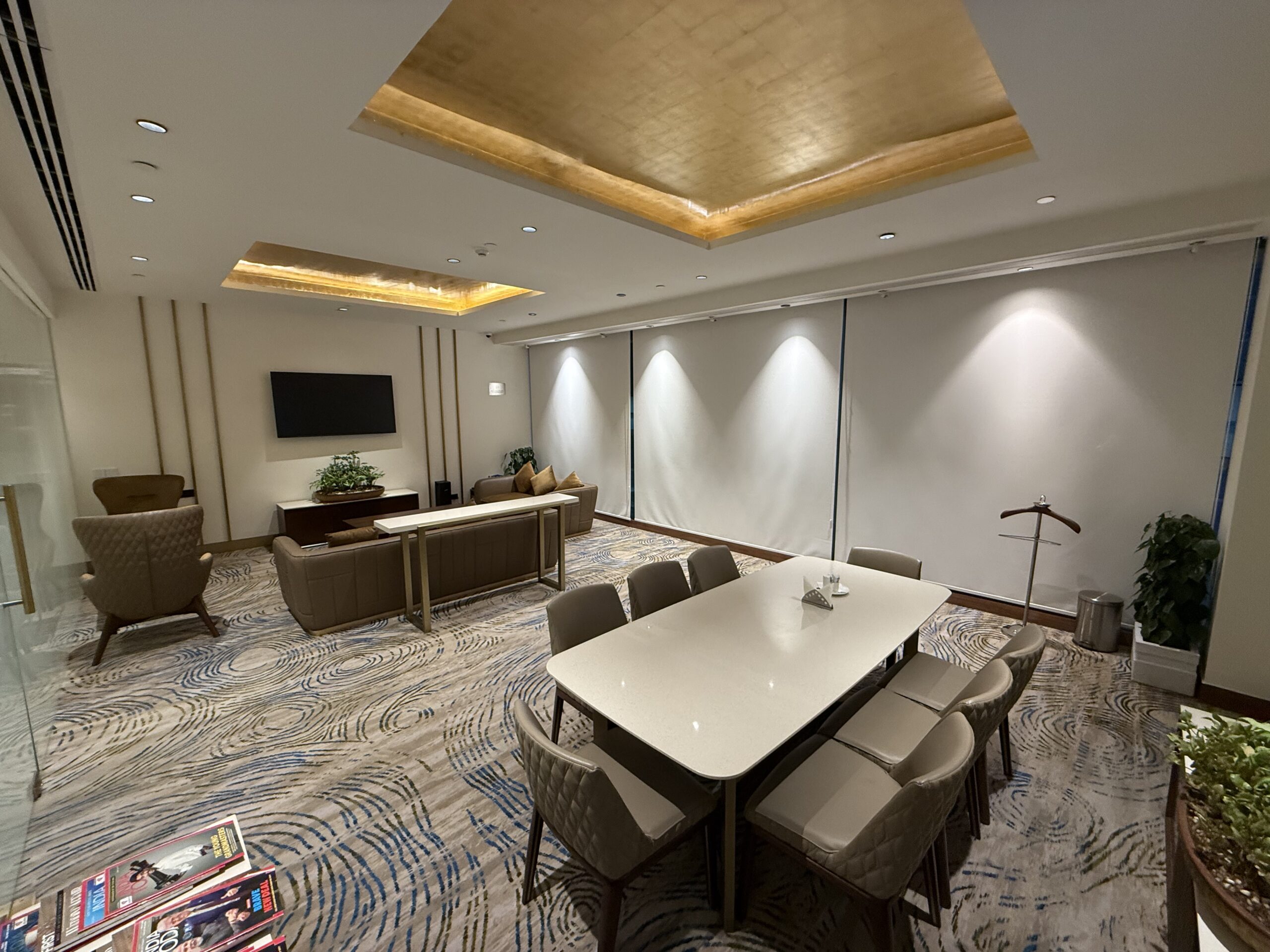 a room with a table and chairs