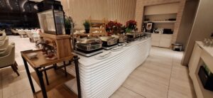 Hilton Honors Status Match Program a buffet line of food
